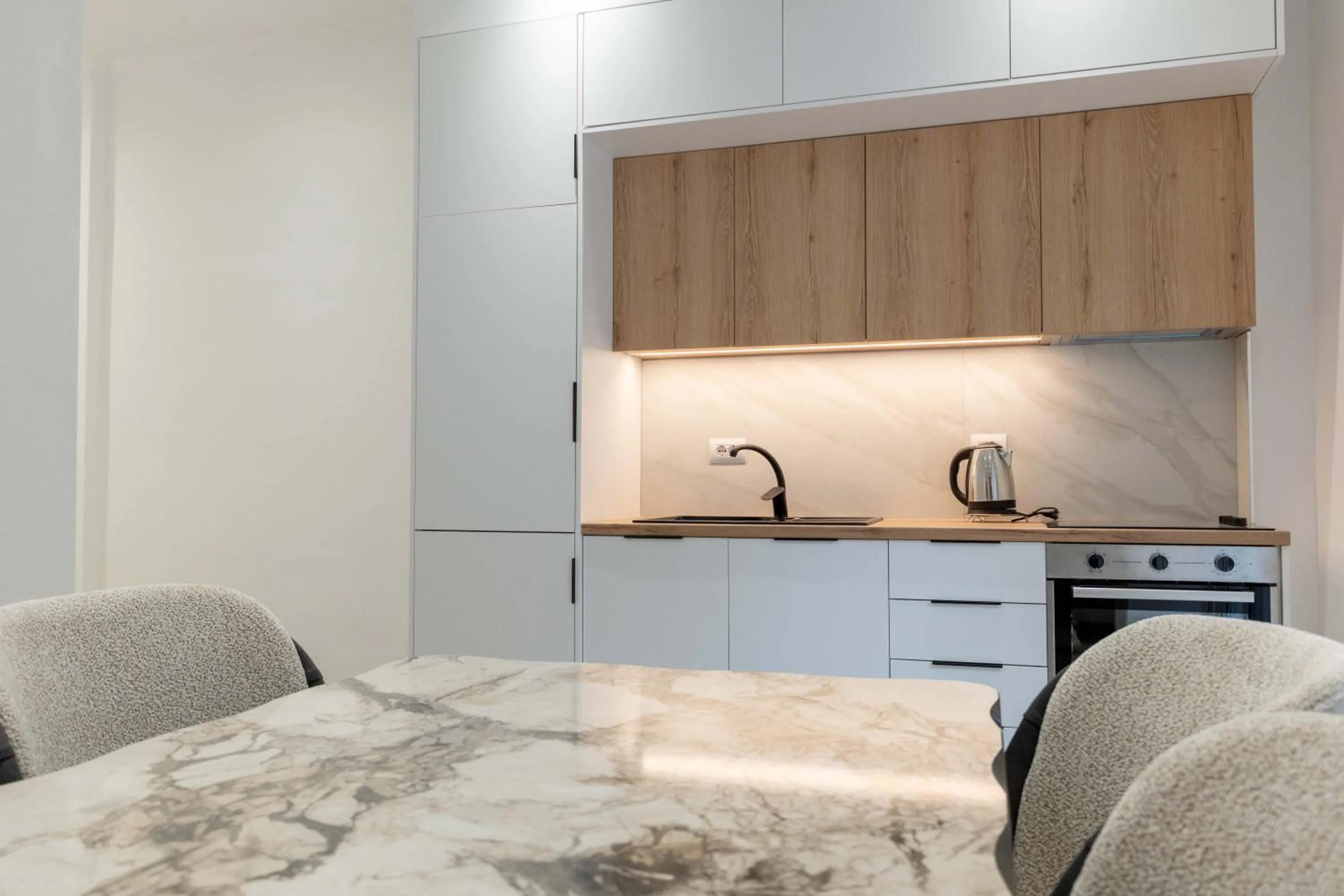 Kitchen or kitchenette in Regal Luxury Apartments