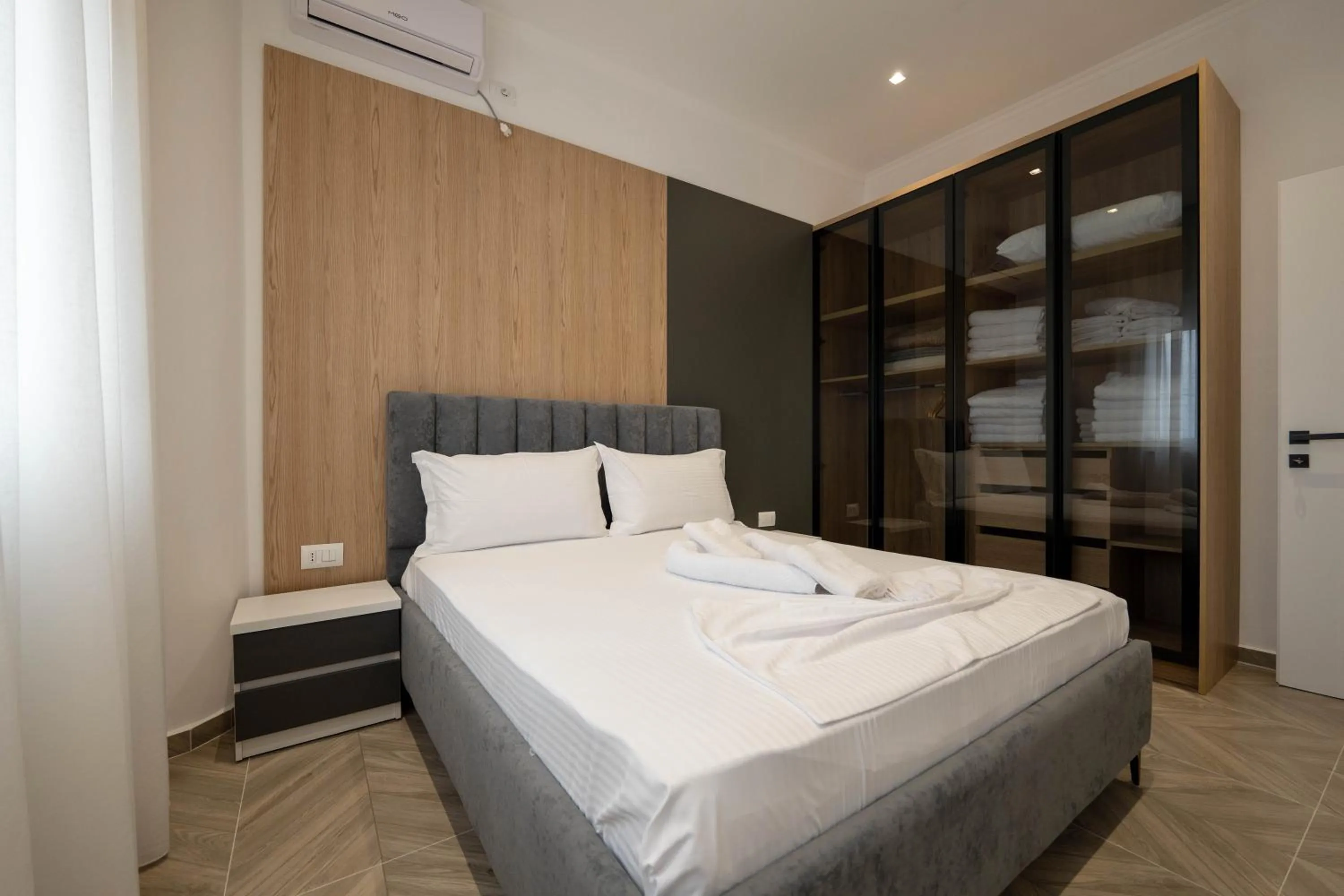 Bed in Regal Luxury Apartments