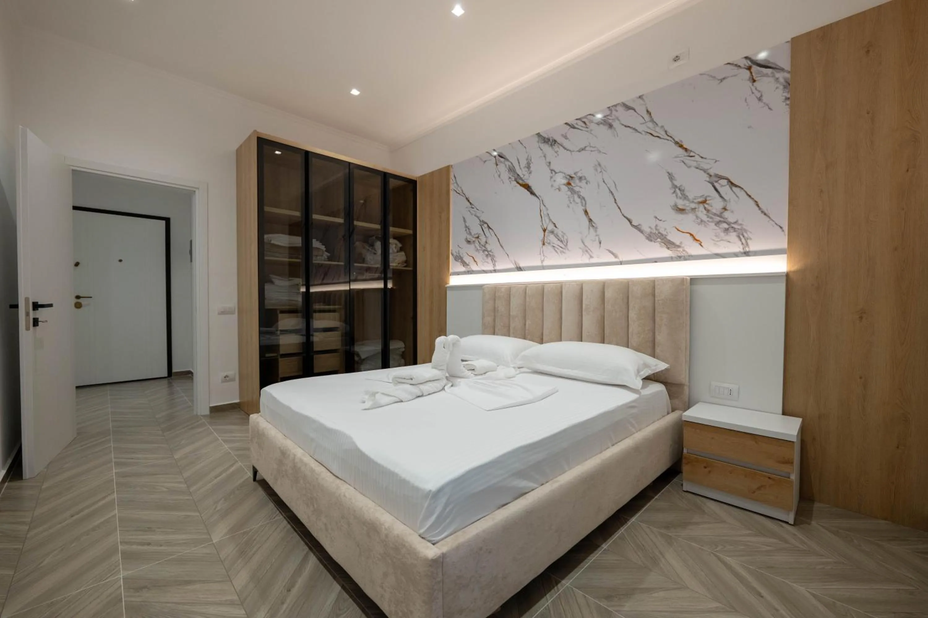 Bed in Regal Luxury Apartments