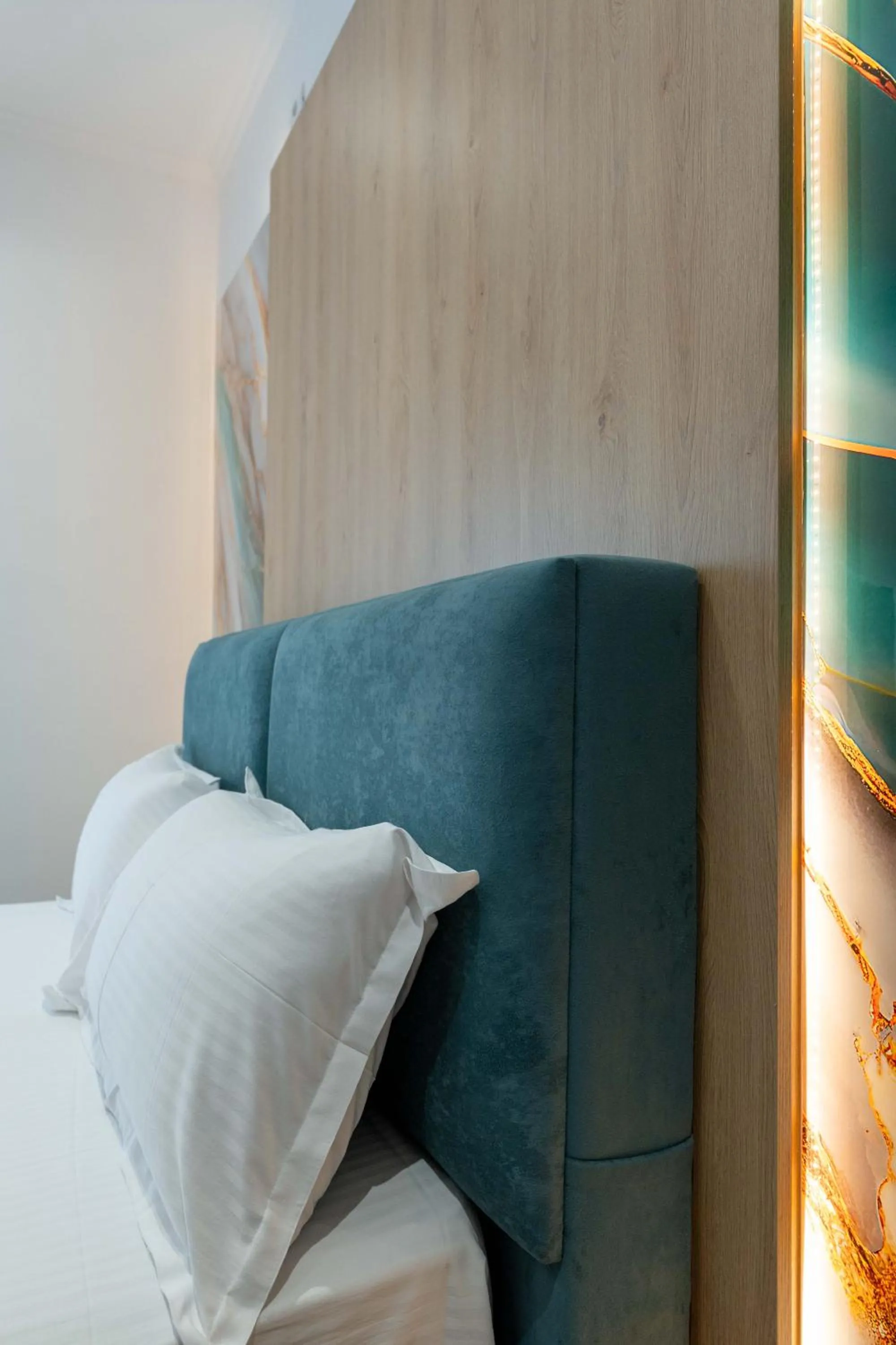 Bed in Regal Luxury Apartments