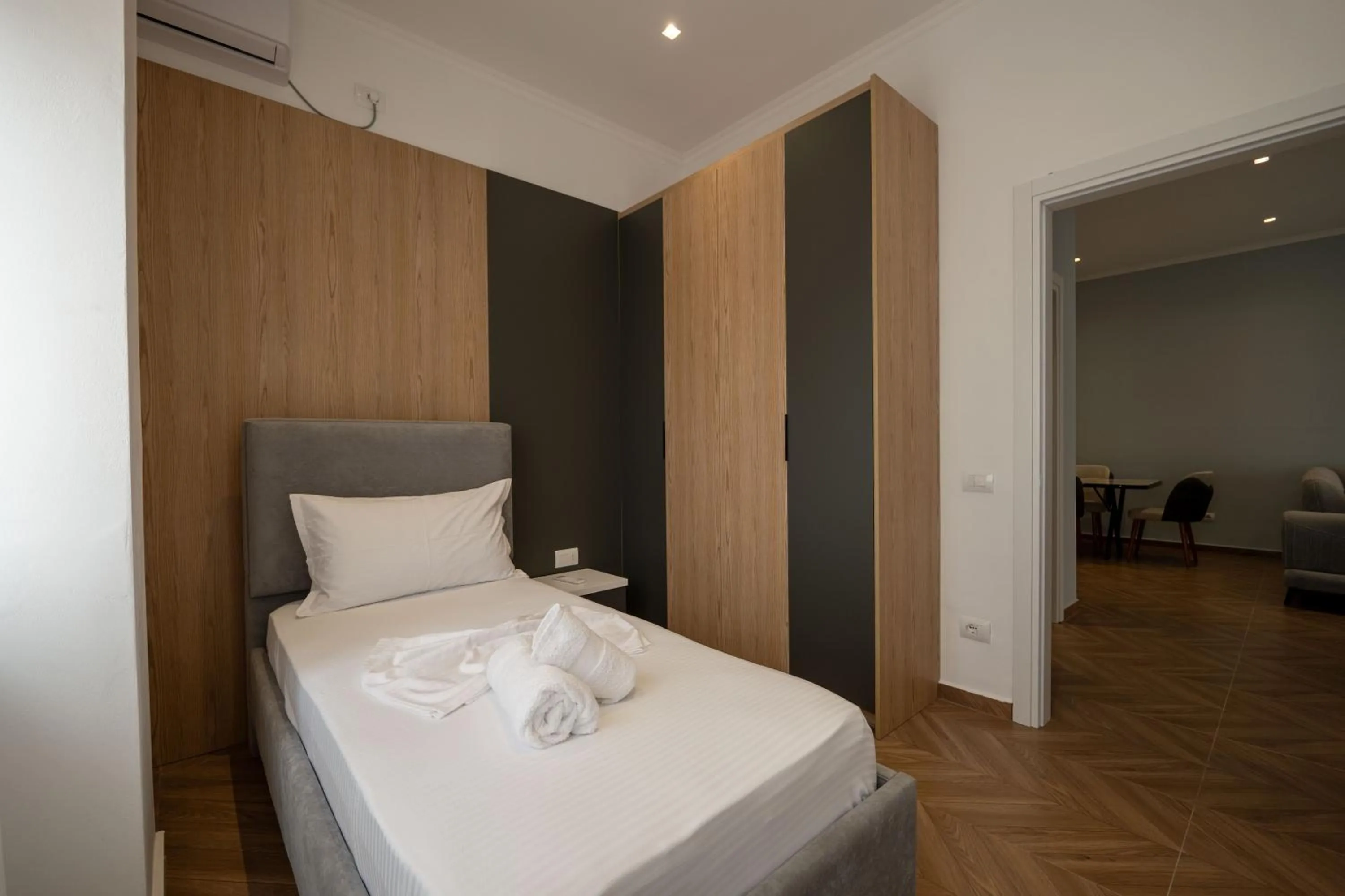 Bed in Regal Luxury Apartments