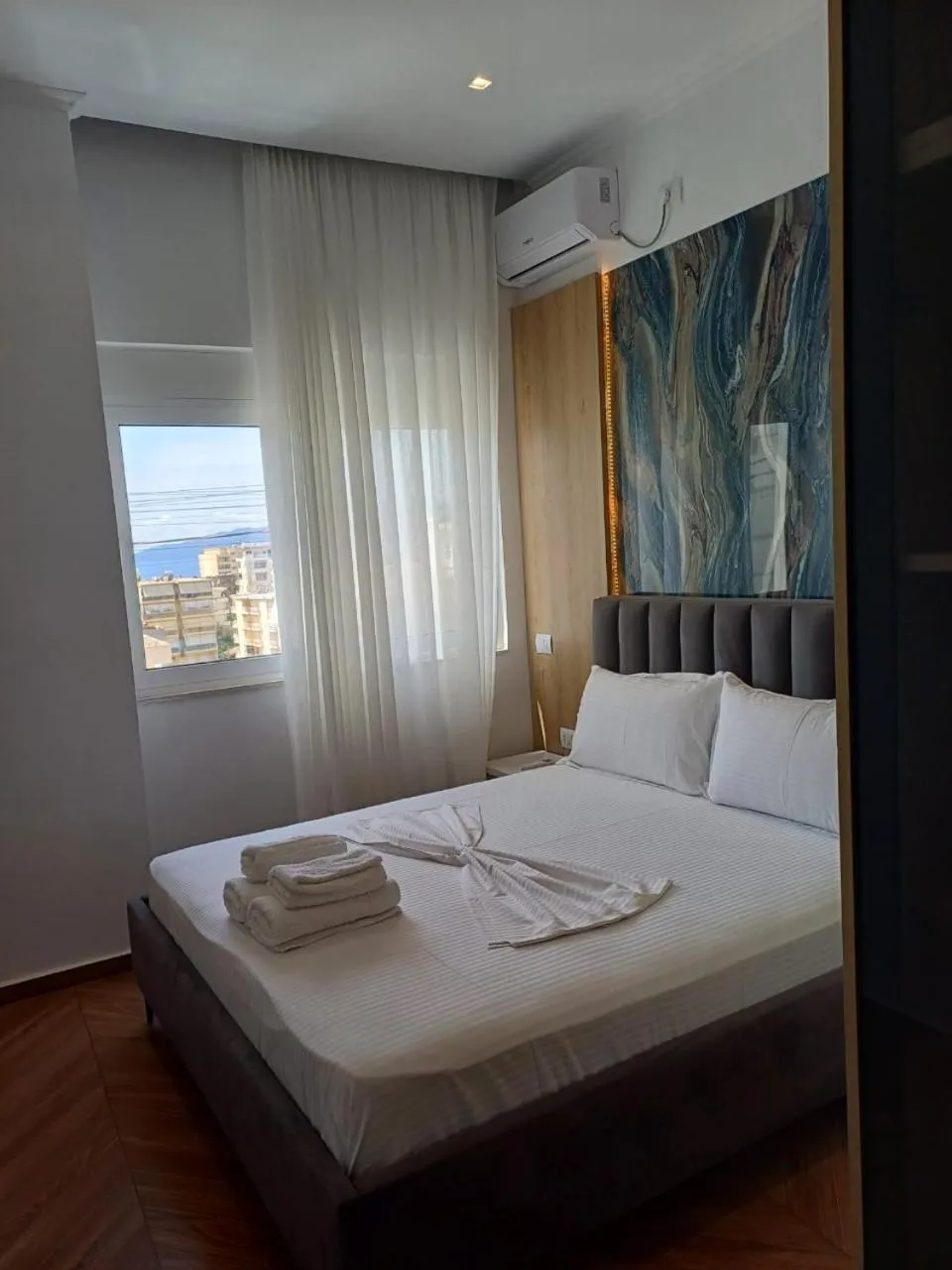 Bed in Regal Luxury Apartments