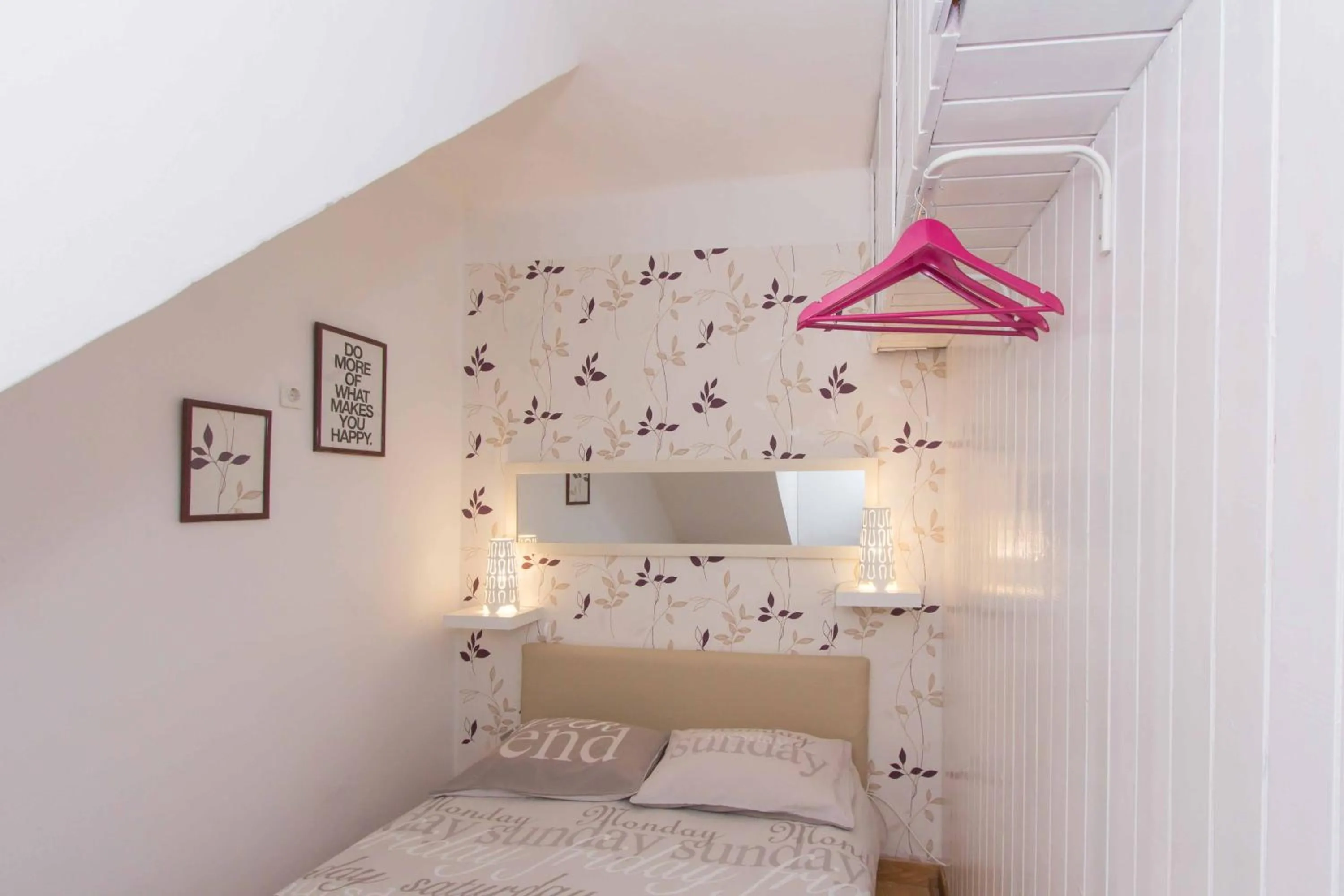 Bed in Red Valentino Apartment