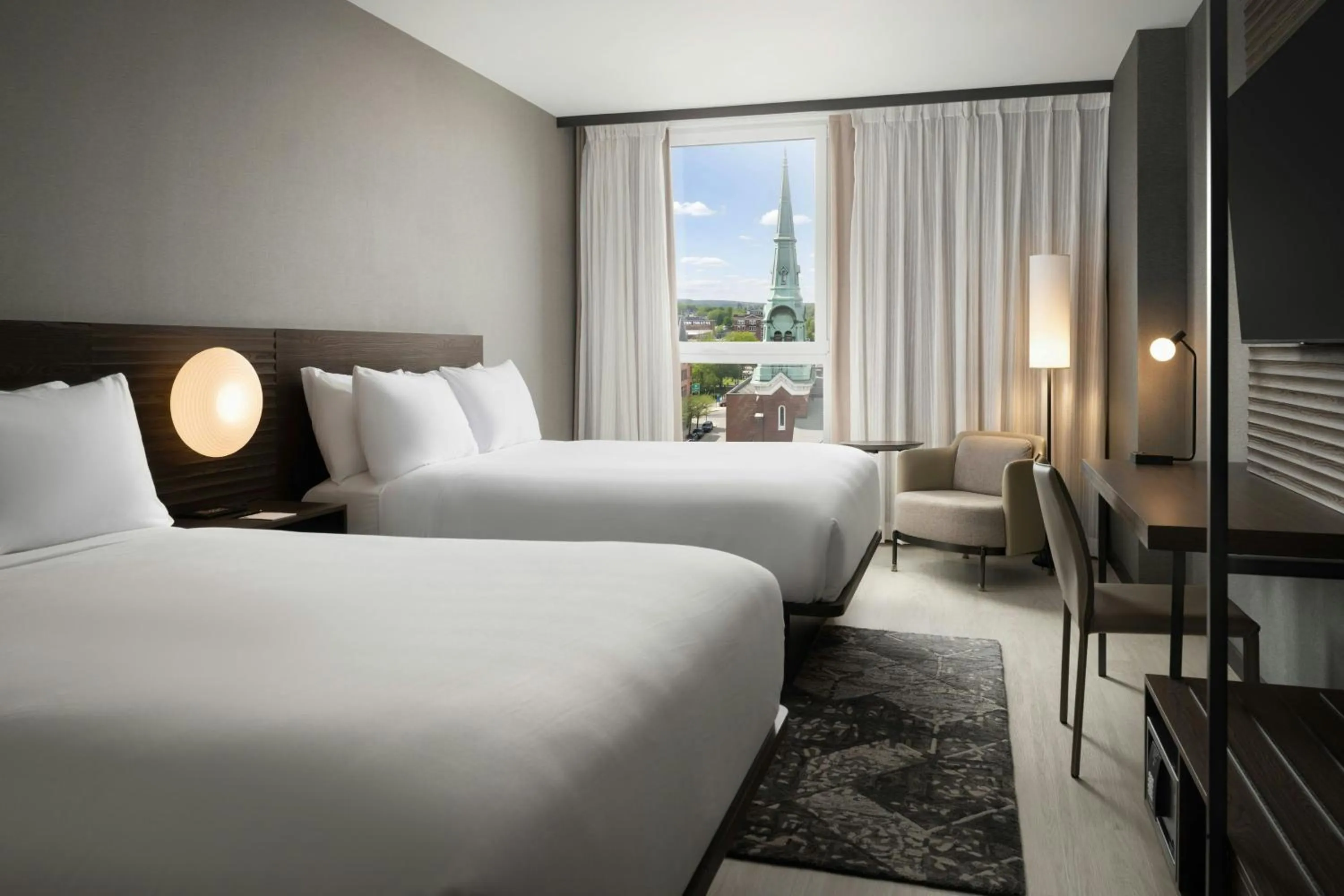 Photo of the whole room, Bed in AC Hotel by Marriott Burlington