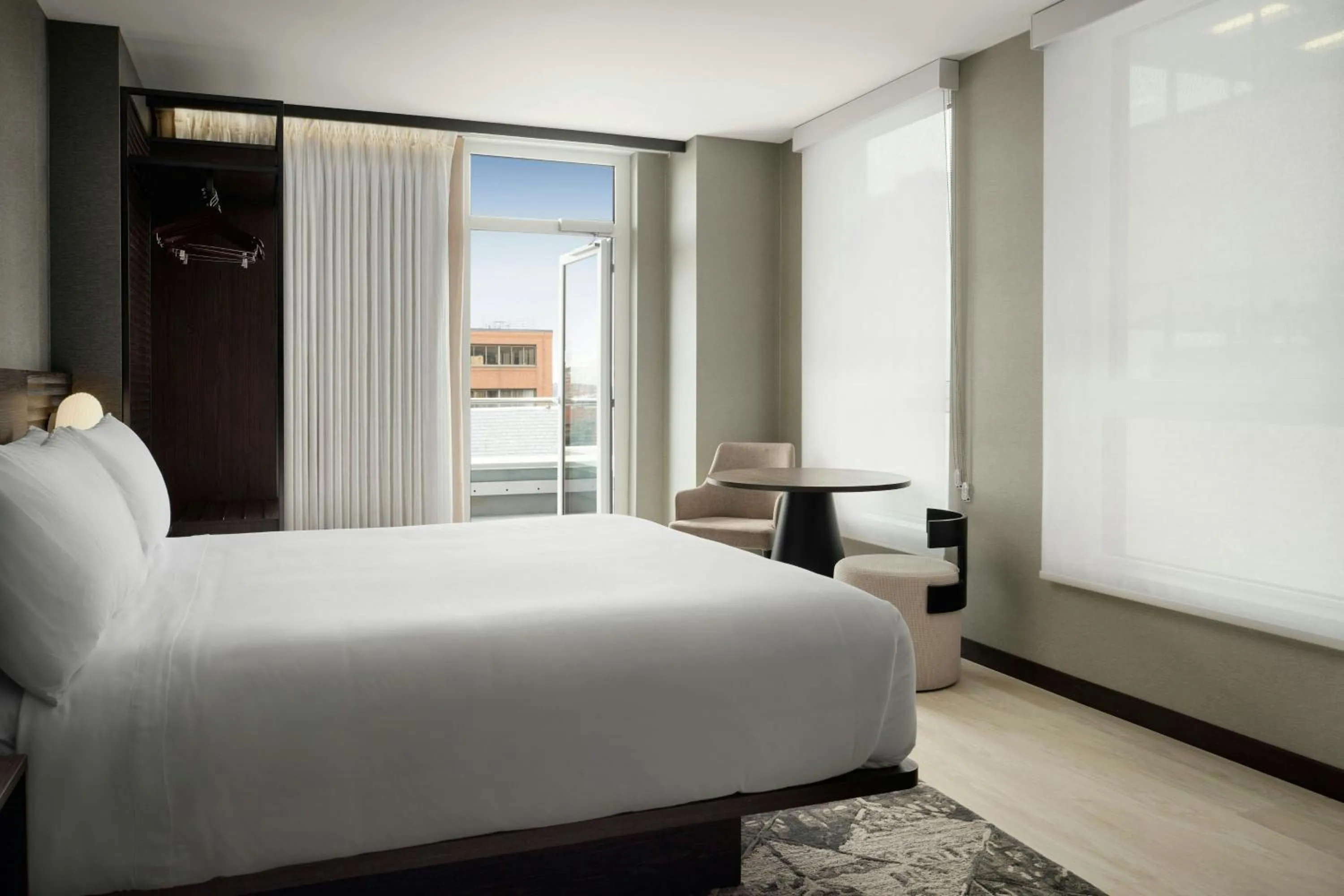 Photo of the whole room, Bed in AC Hotel by Marriott Burlington