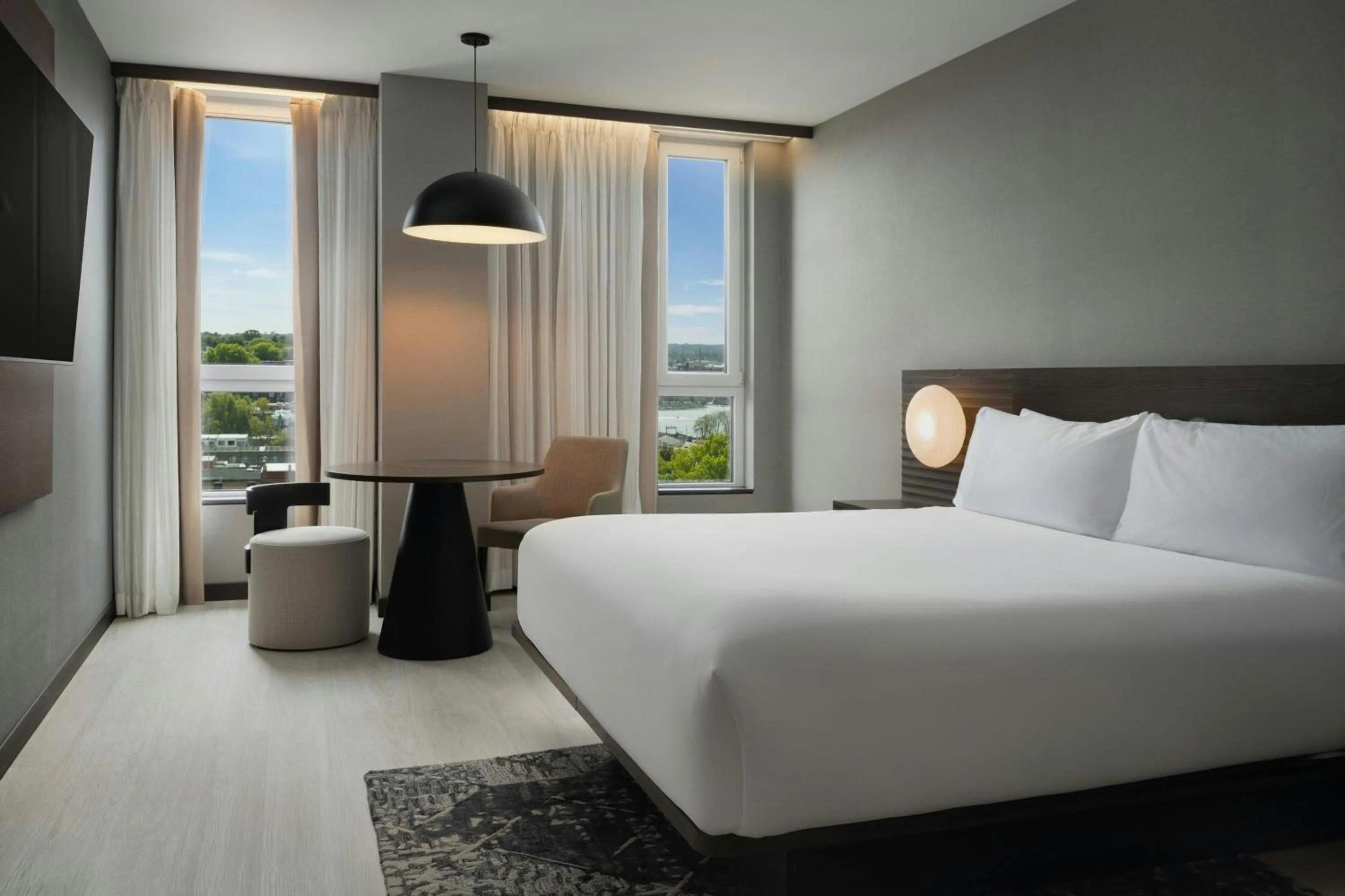 Photo of the whole room, Bed in AC Hotel by Marriott Burlington