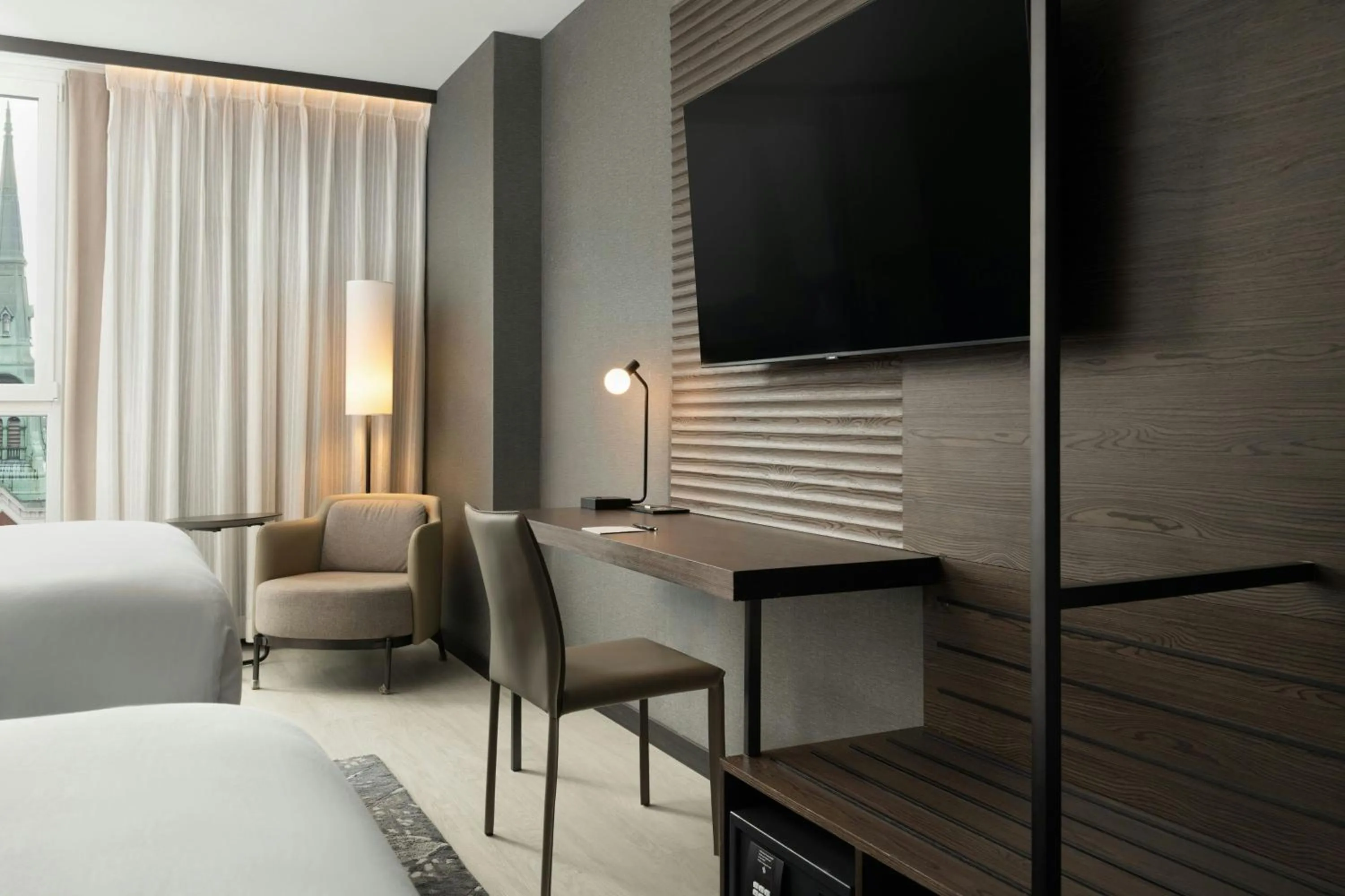 Photo of the whole room, Bed in AC Hotel by Marriott Burlington