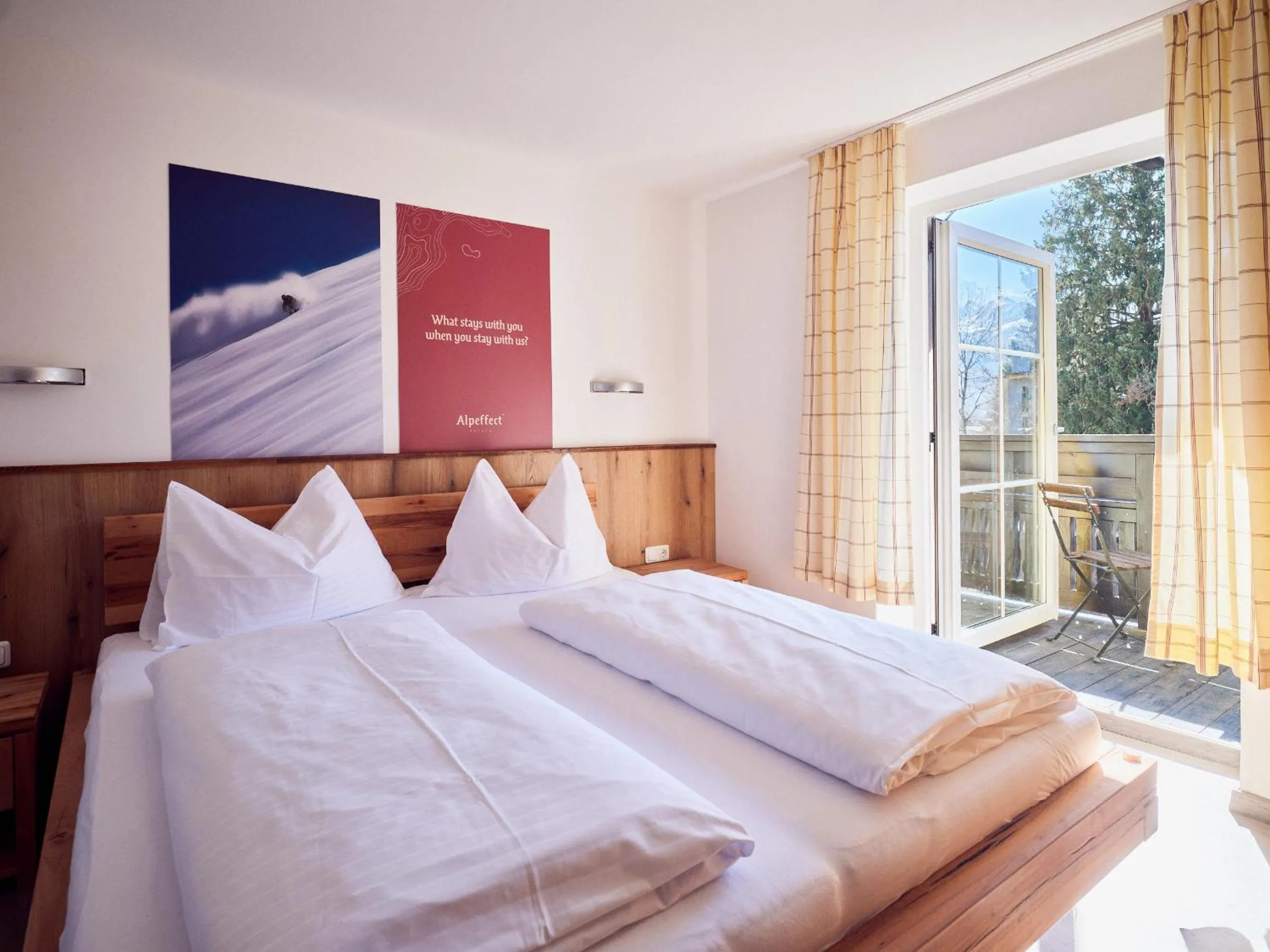Bedroom, Bed in Hotel Pinzgauerhof by Alpeffect Hotels