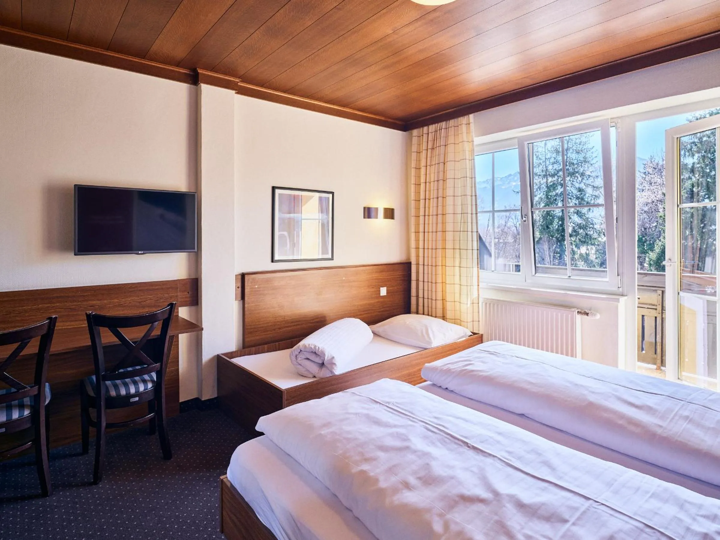 Bed in Hotel Pinzgauerhof by Alpeffect Hotels