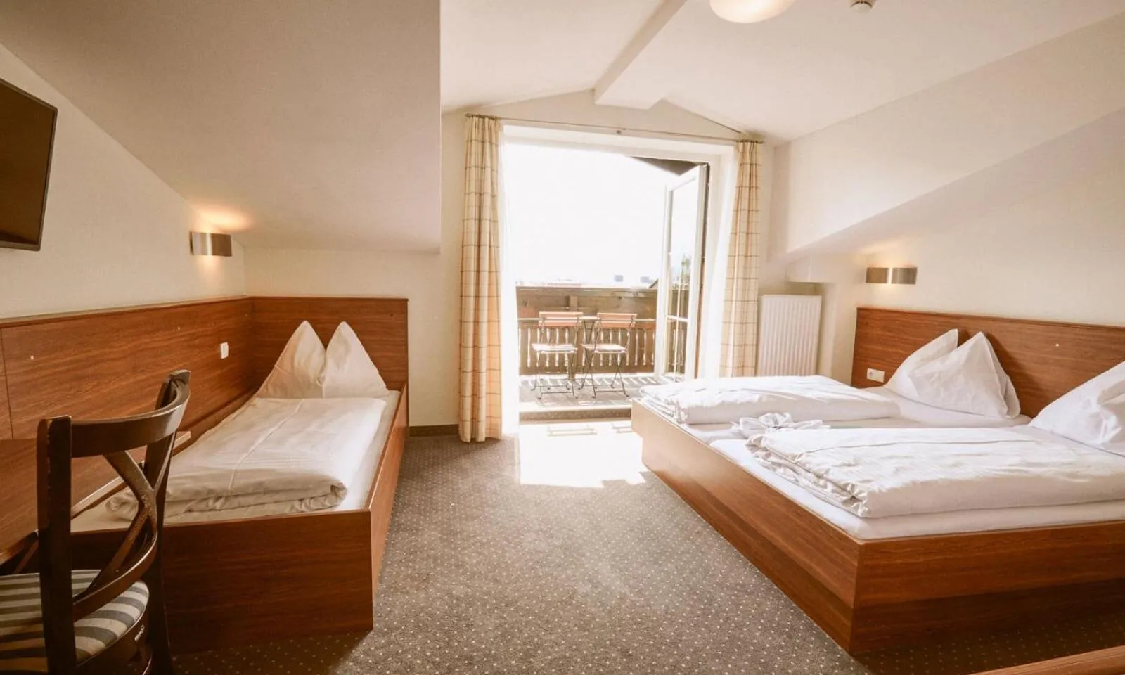 Bed in Hotel Pinzgauerhof by Alpeffect Hotels