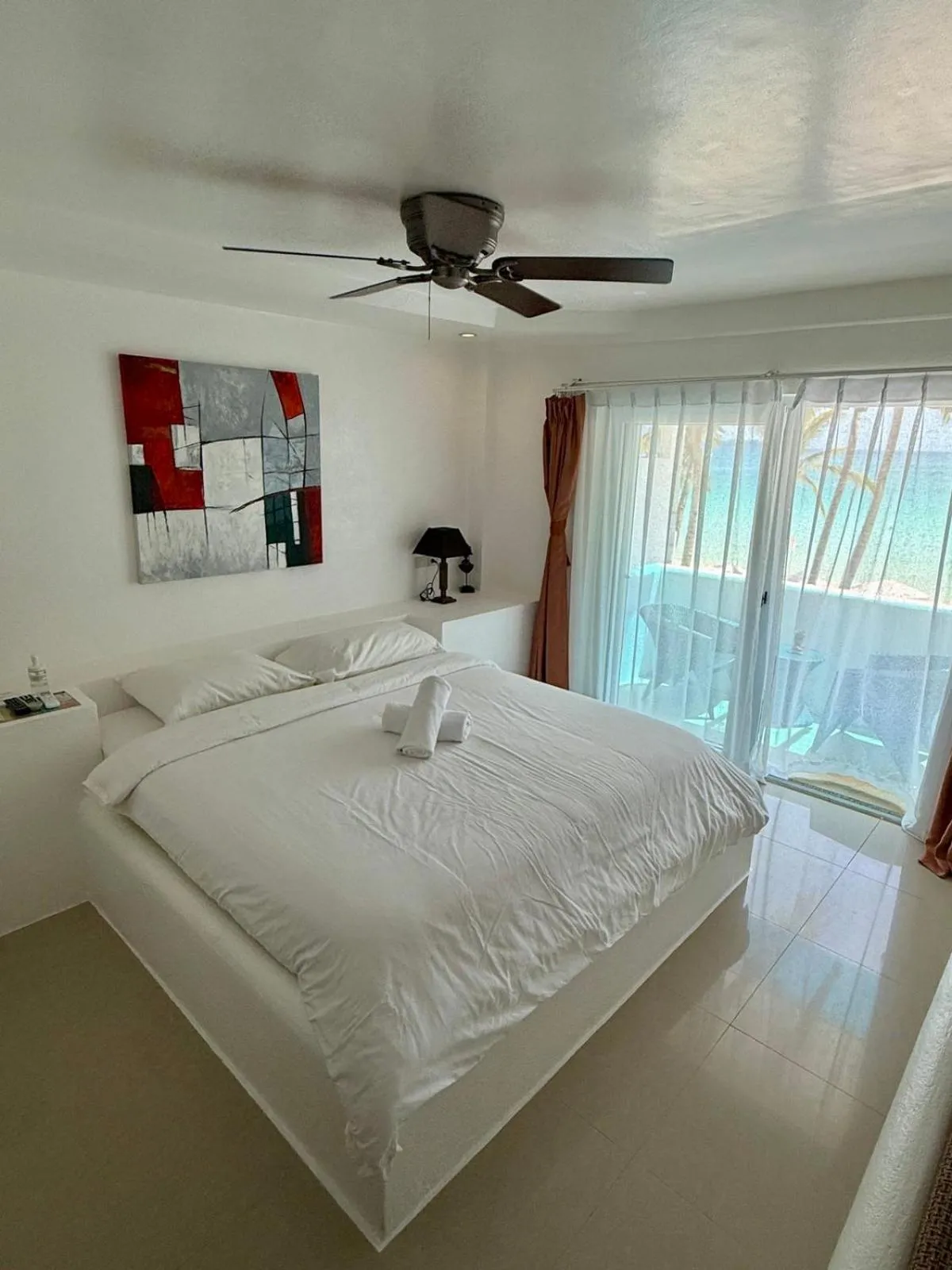 Bed in Calypso Beach and Dive Resort