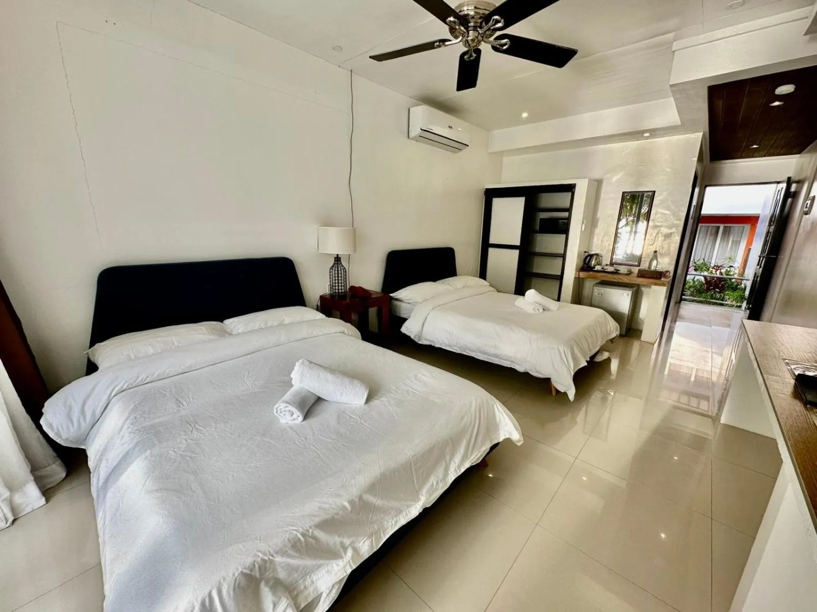 Bed in Calypso Beach and Dive Resort