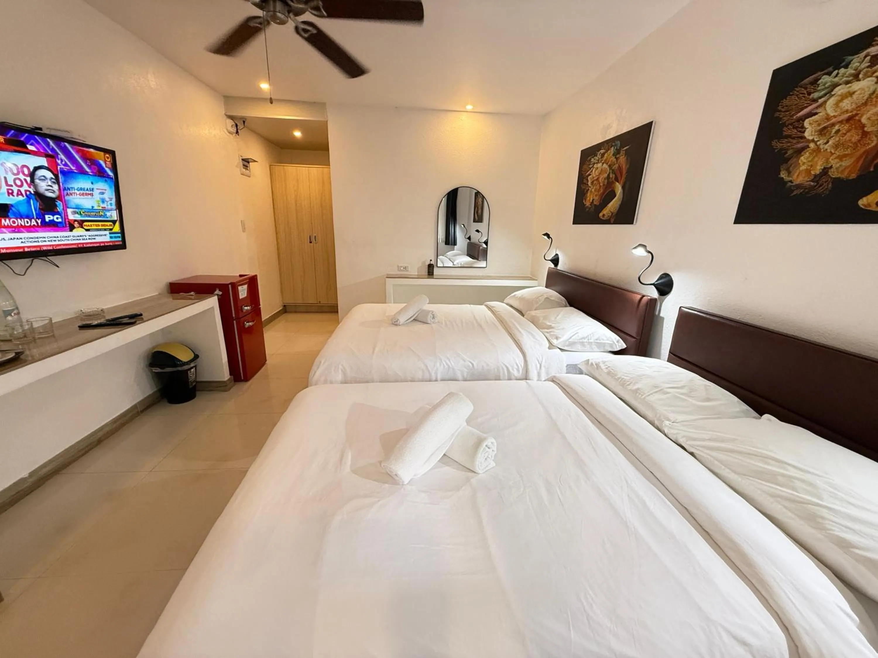 Bed in Calypso Beach and Dive Resort