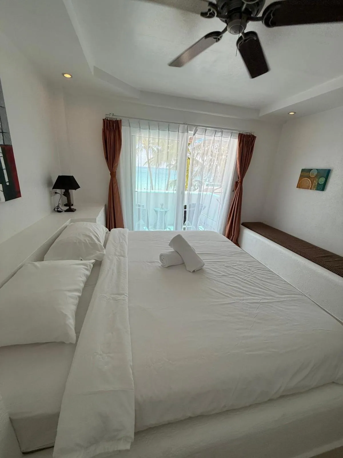 Bed in Calypso Beach and Dive Resort