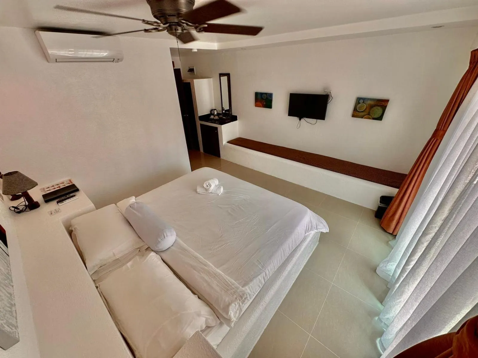 Bed in Calypso Beach and Dive Resort