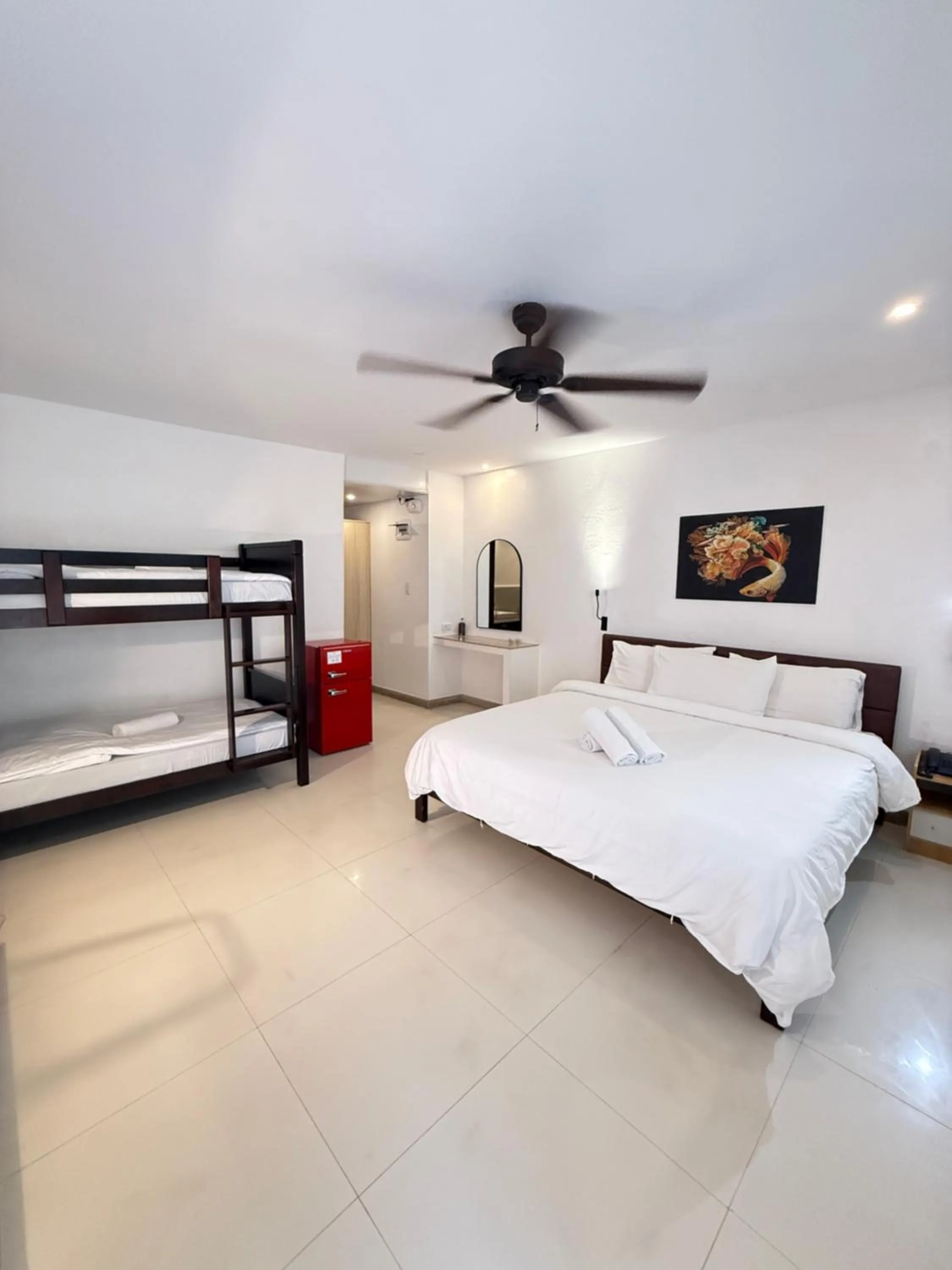 Bed in Calypso Beach and Dive Resort