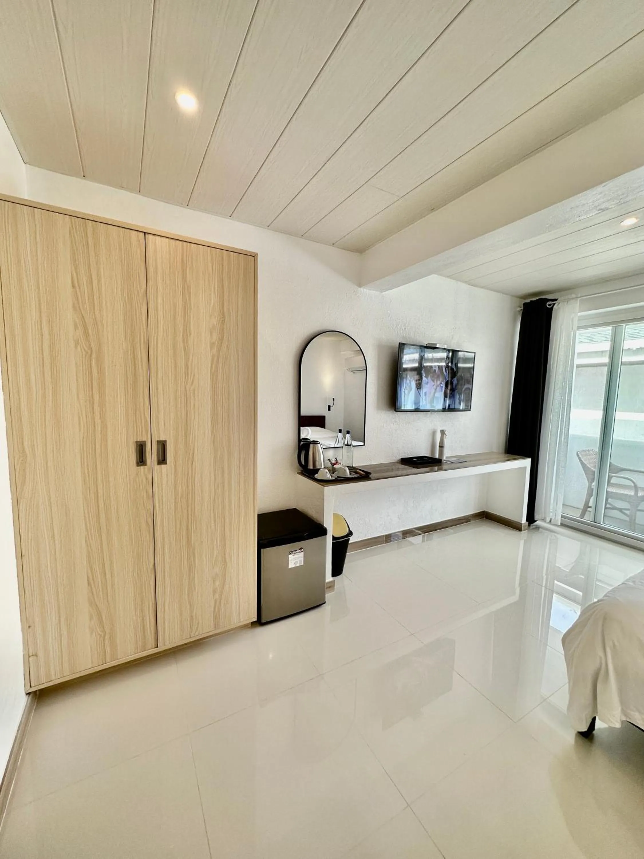 TV and multimedia, Bed in Calypso Beach and Dive Resort