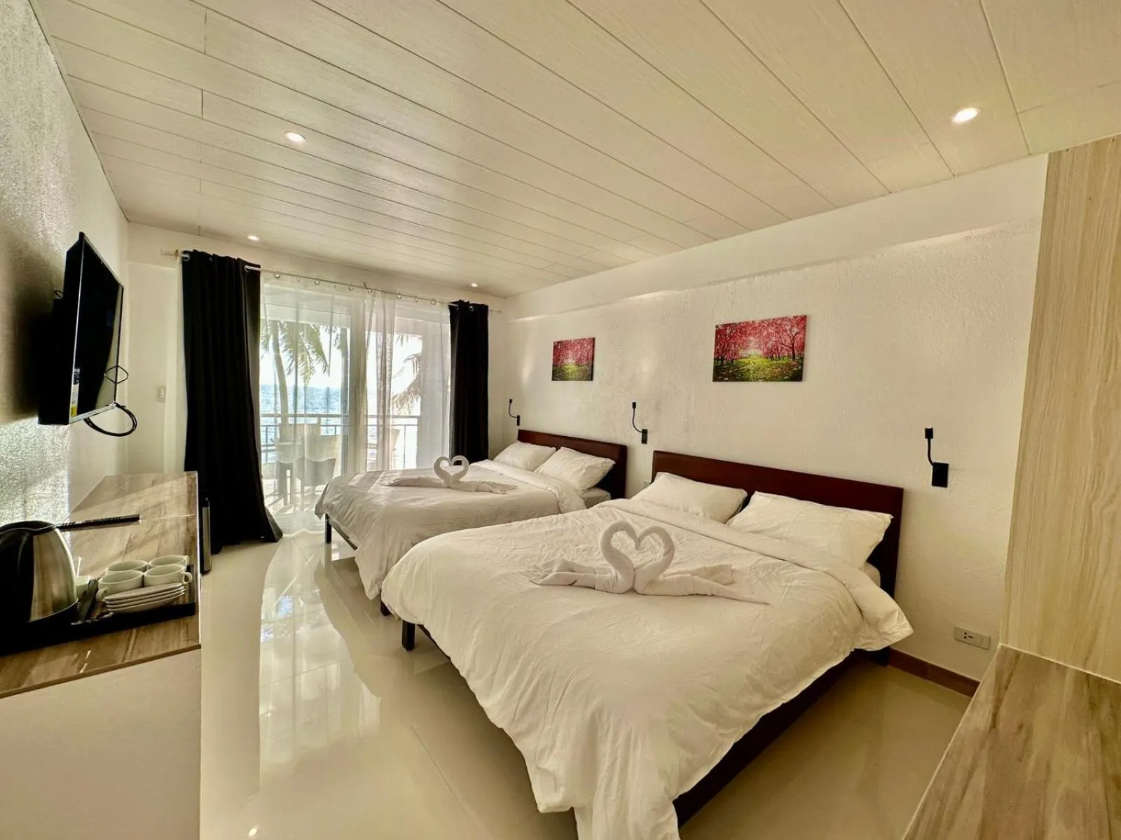 Bed in Calypso Beach and Dive Resort
