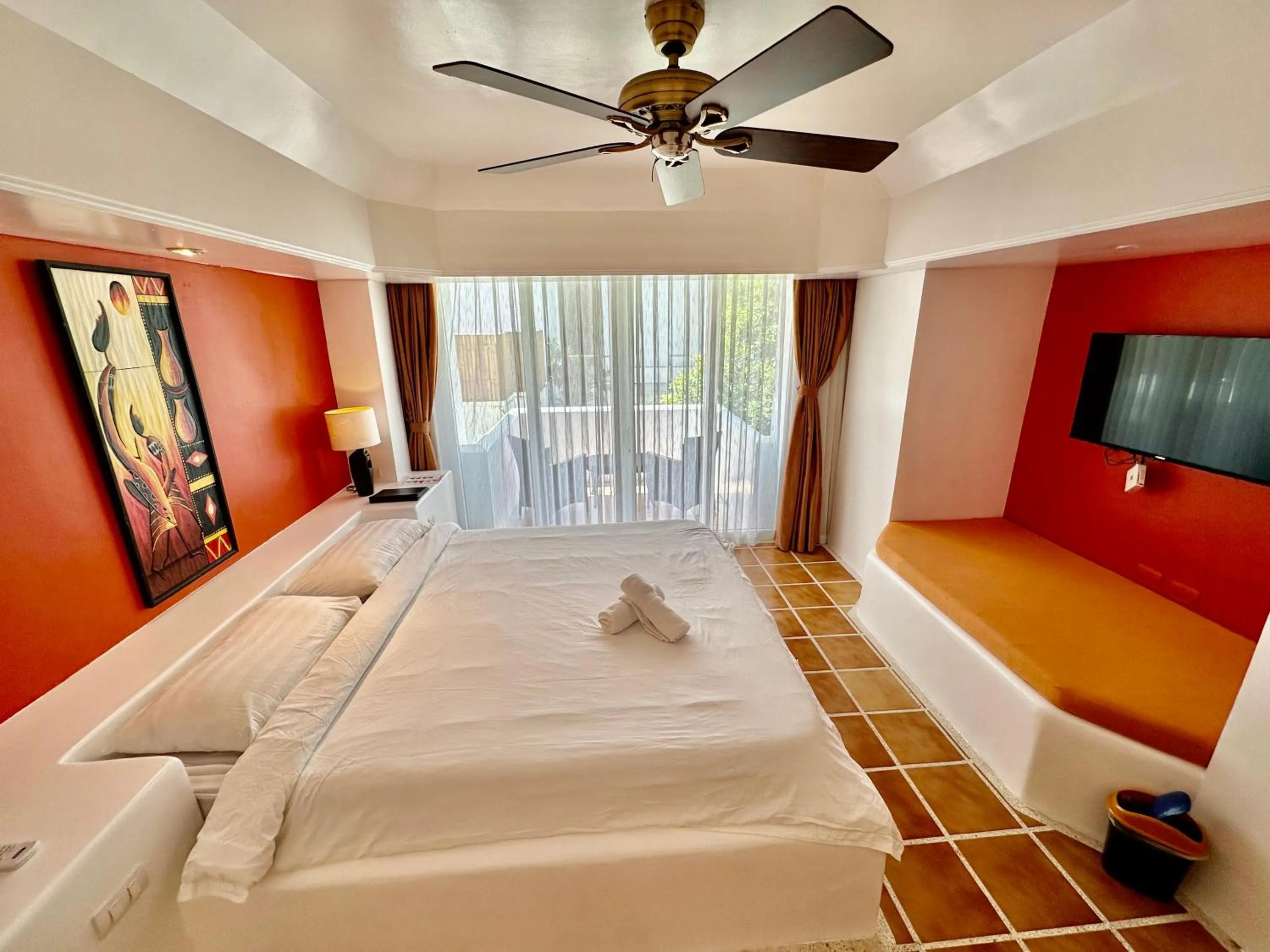 Bed in Calypso Beach and Dive Resort
