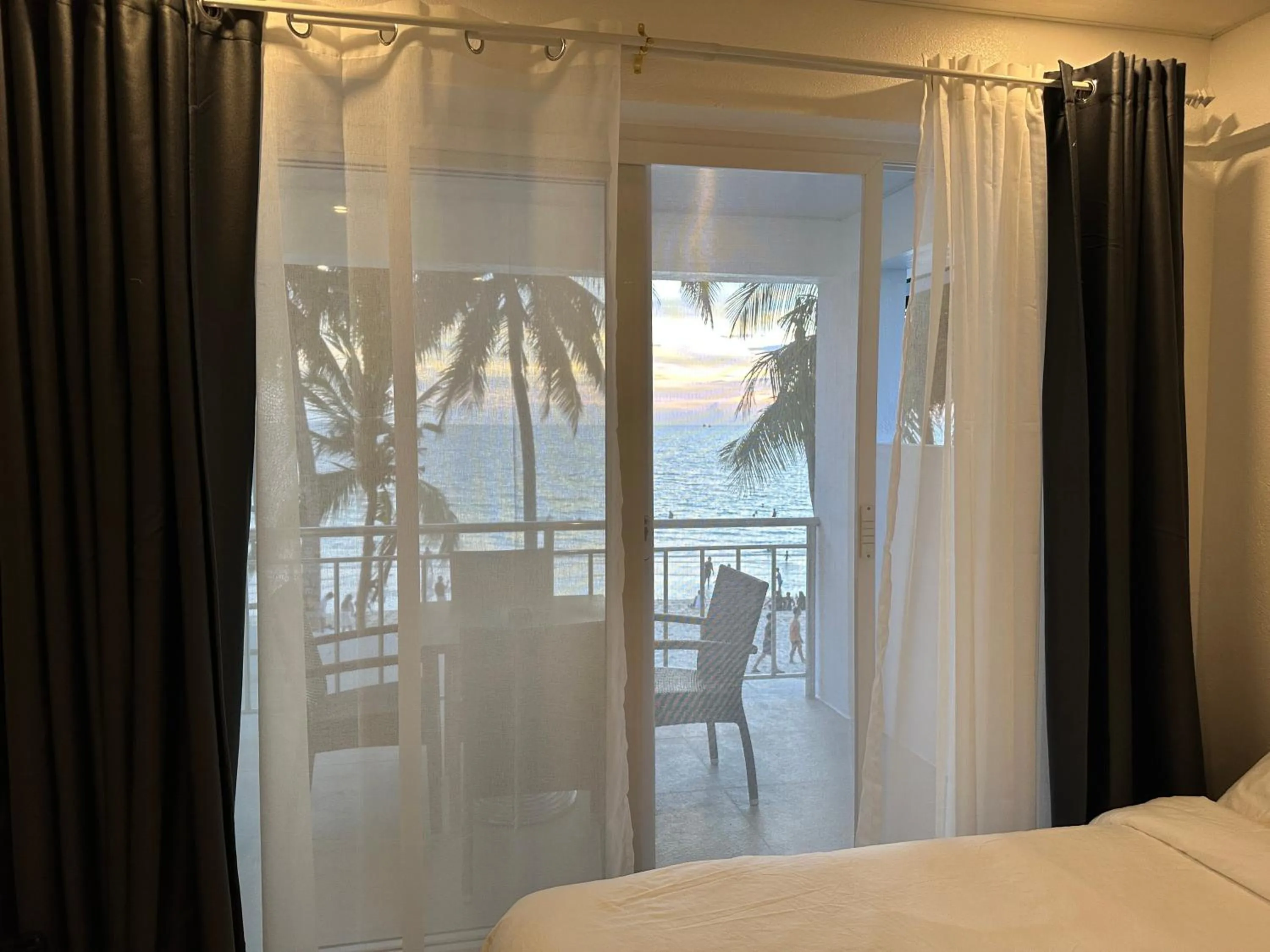 Sea view, Bed in Calypso Beach and Dive Resort