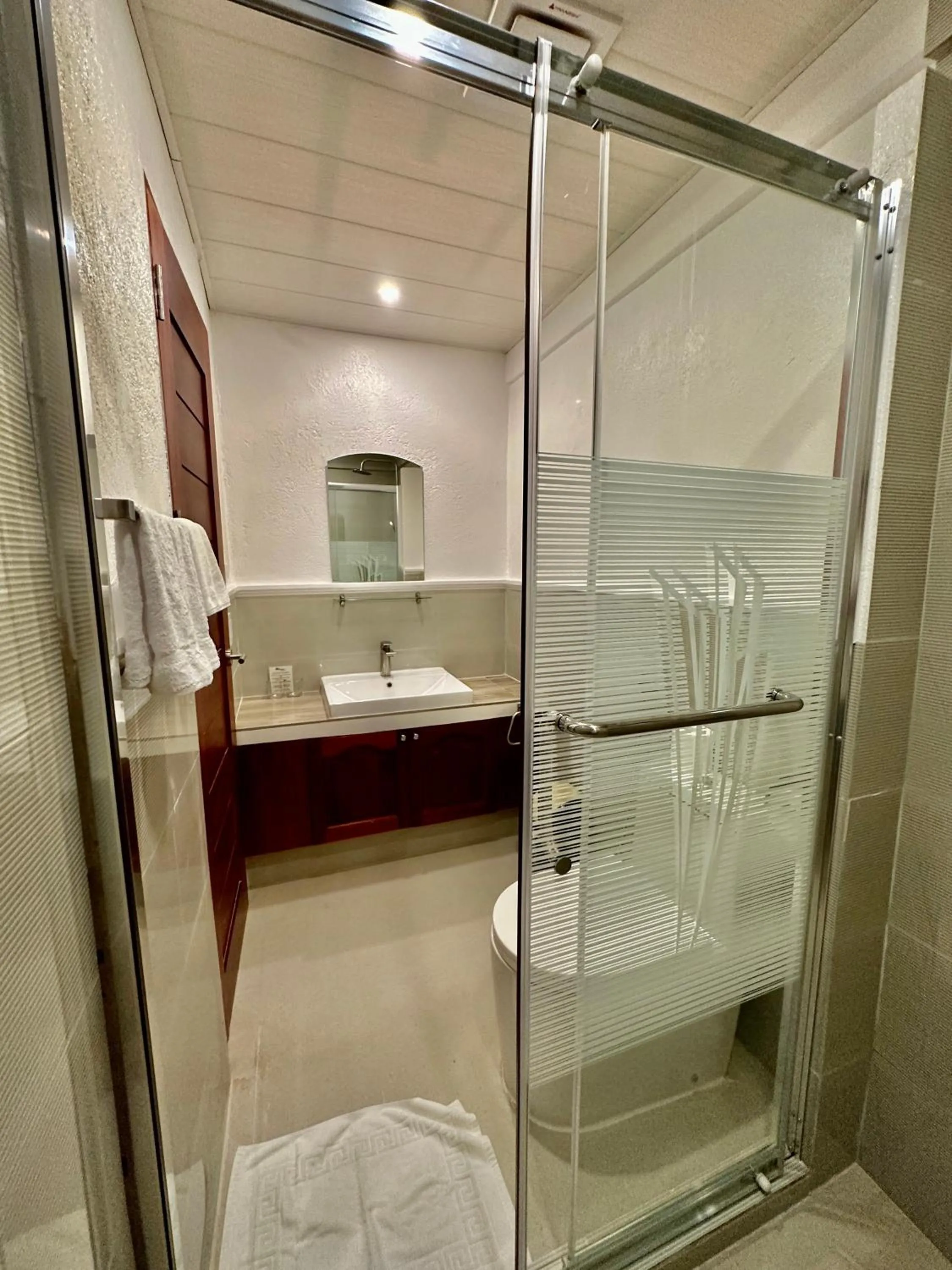 Bathroom in Calypso Beach and Dive Resort