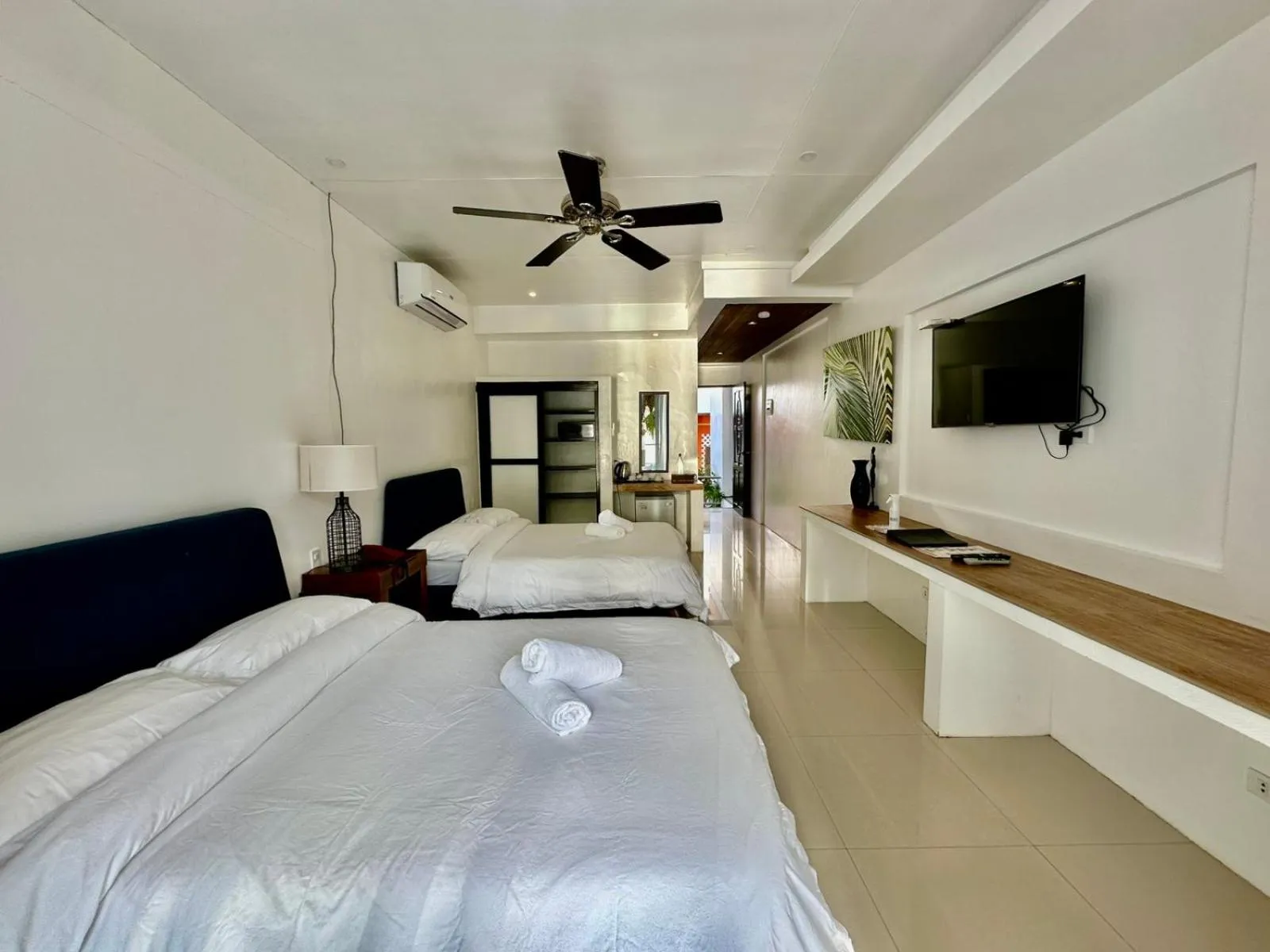 Bed in Calypso Beach and Dive Resort