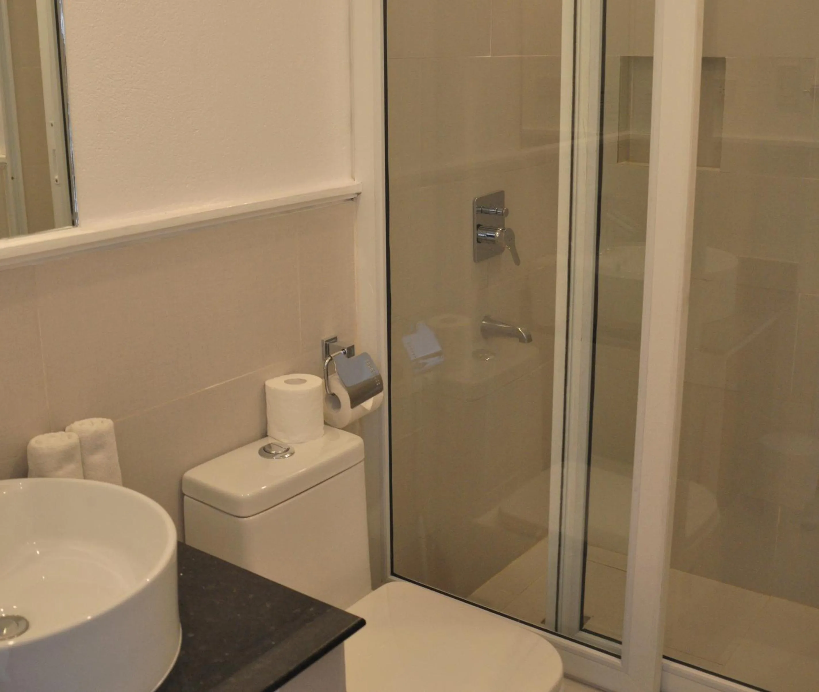 Bathroom in Calypso Beach and Dive Resort