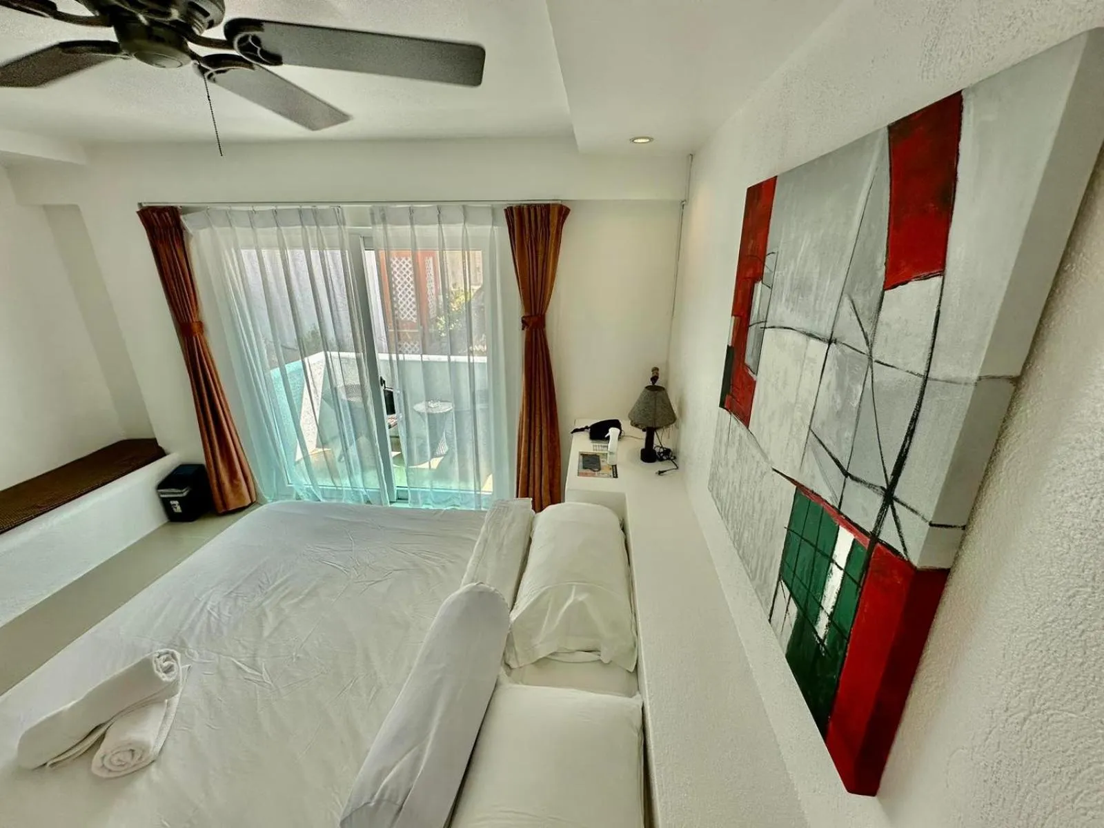 Bed in Calypso Beach and Dive Resort