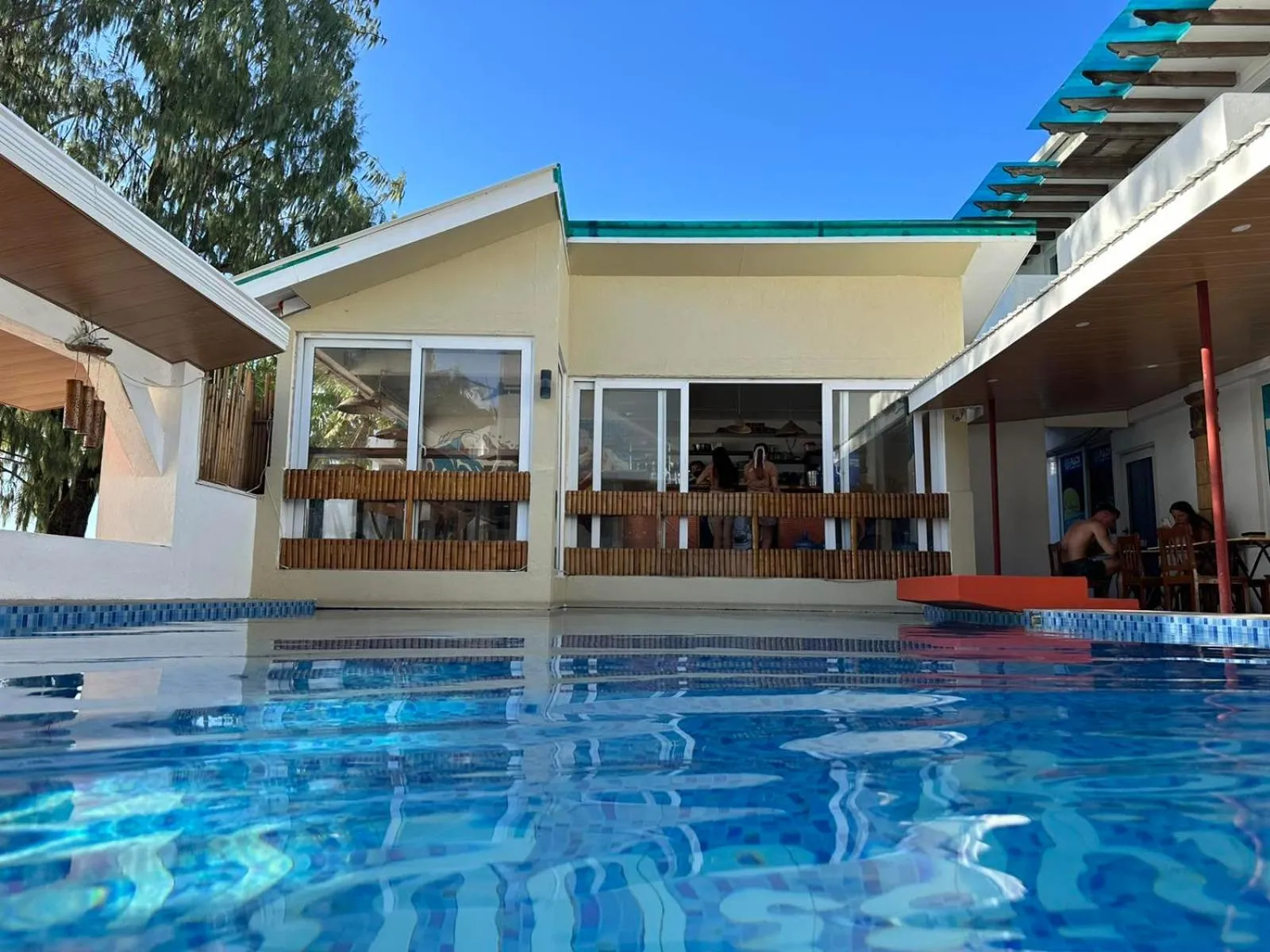 Swimming pool in Calypso Beach and Dive Resort