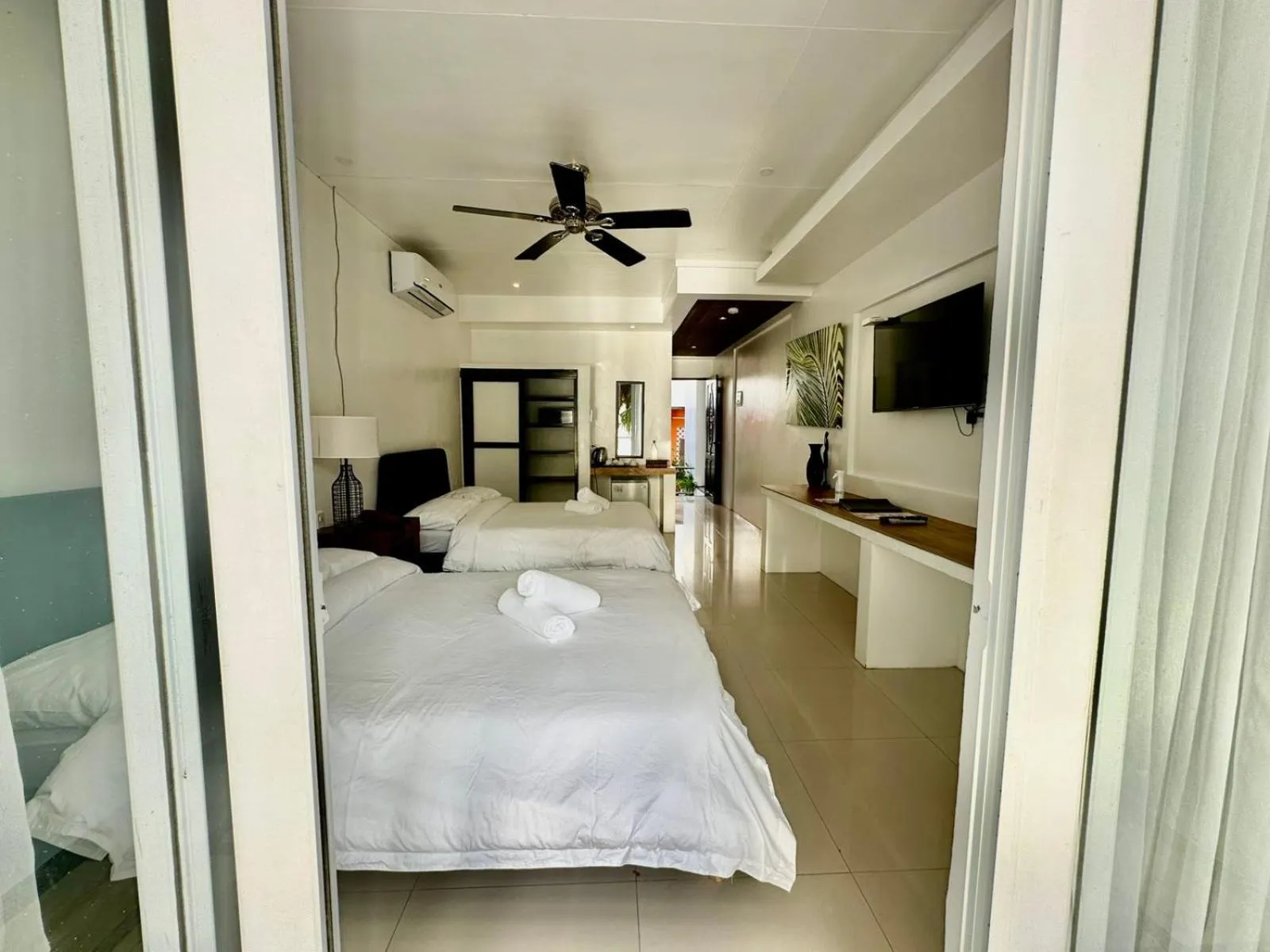 Bed in Calypso Beach and Dive Resort