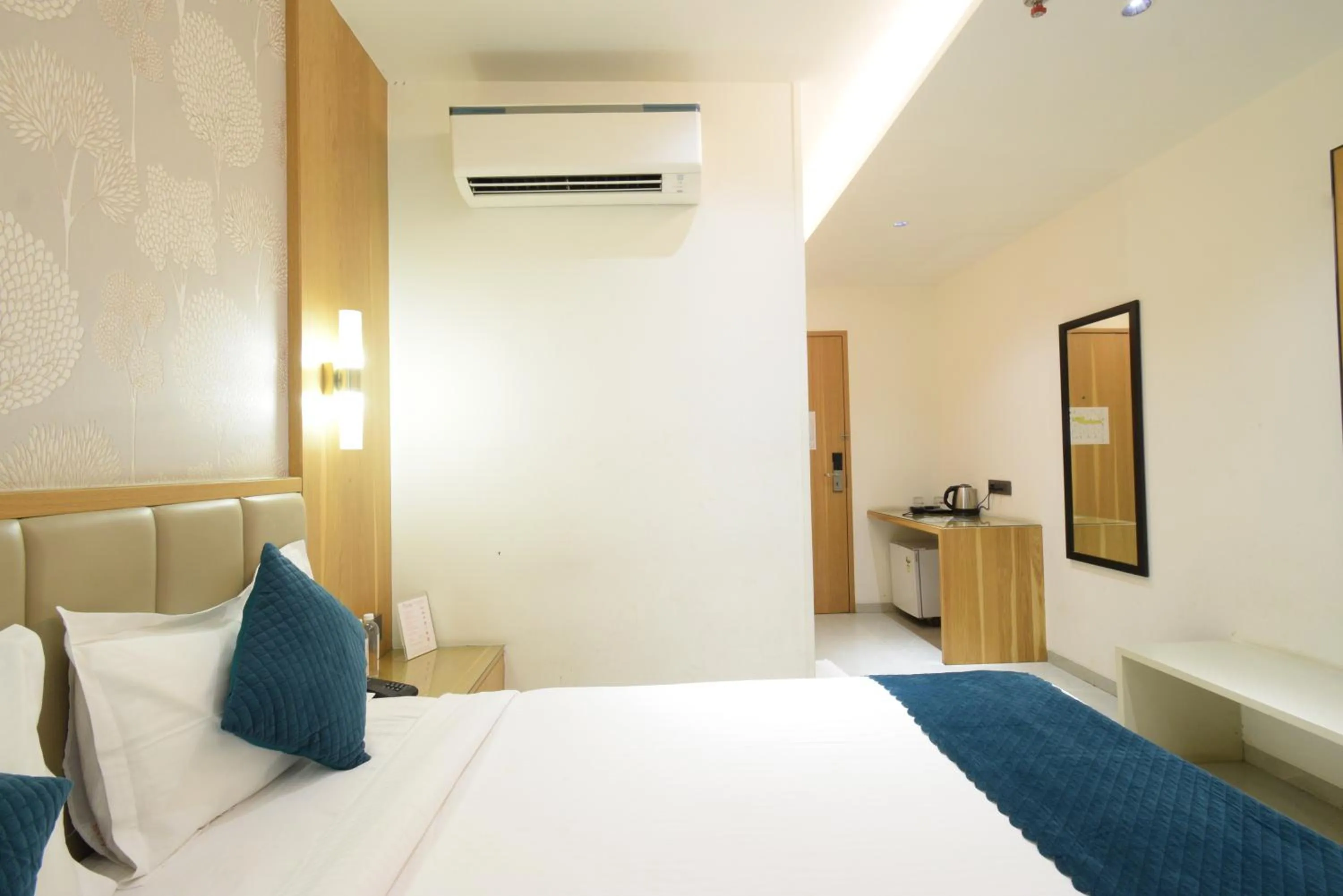 Photo of the whole room, Bed in Hotel TAAR TANGERINE Gachibowli