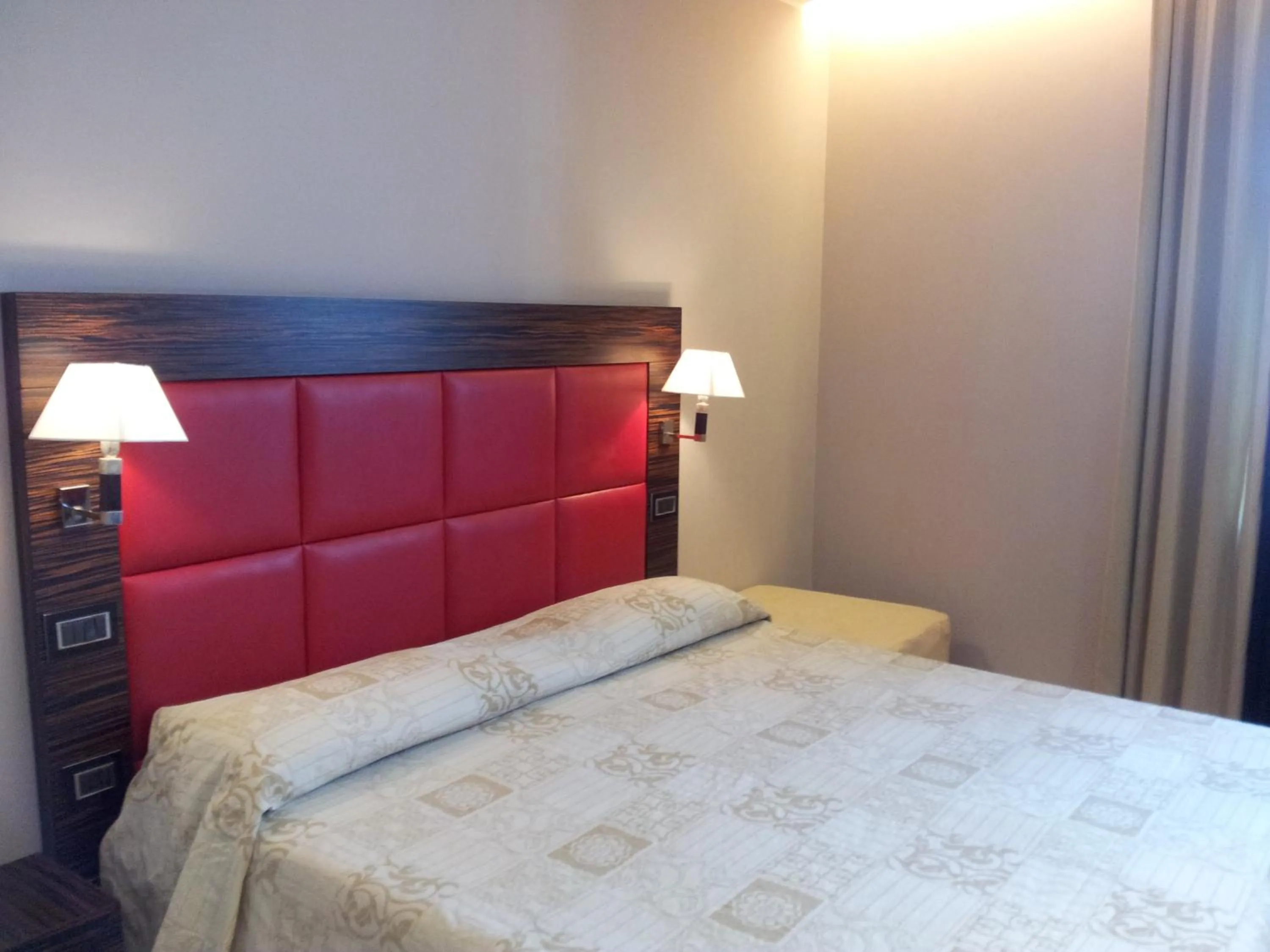 Bed in Hotel Excelsior