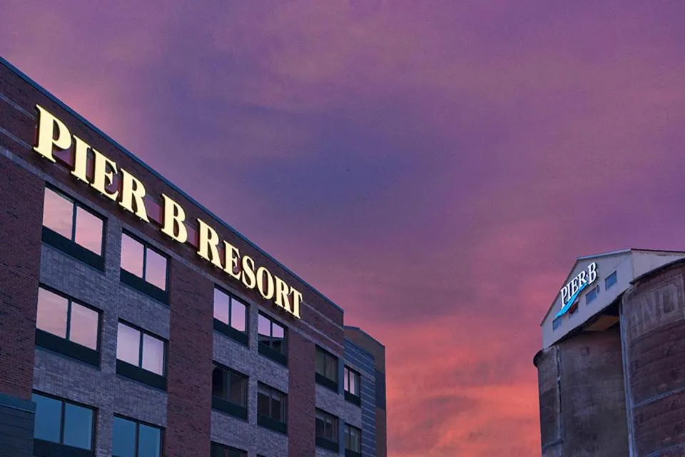 Property logo or sign in Pier B Resort