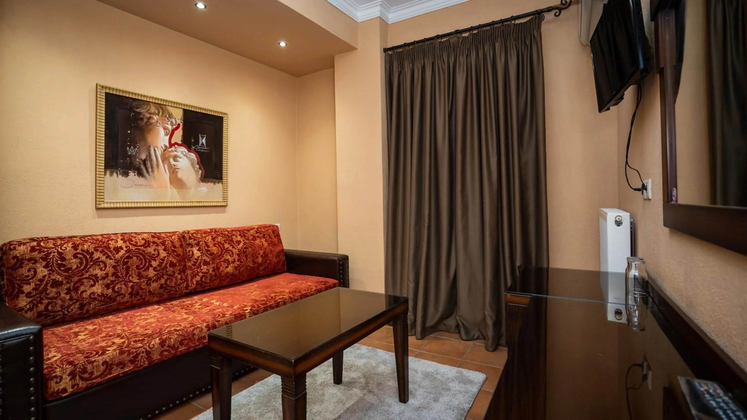 Seating area in Dellas Boutique Hotel