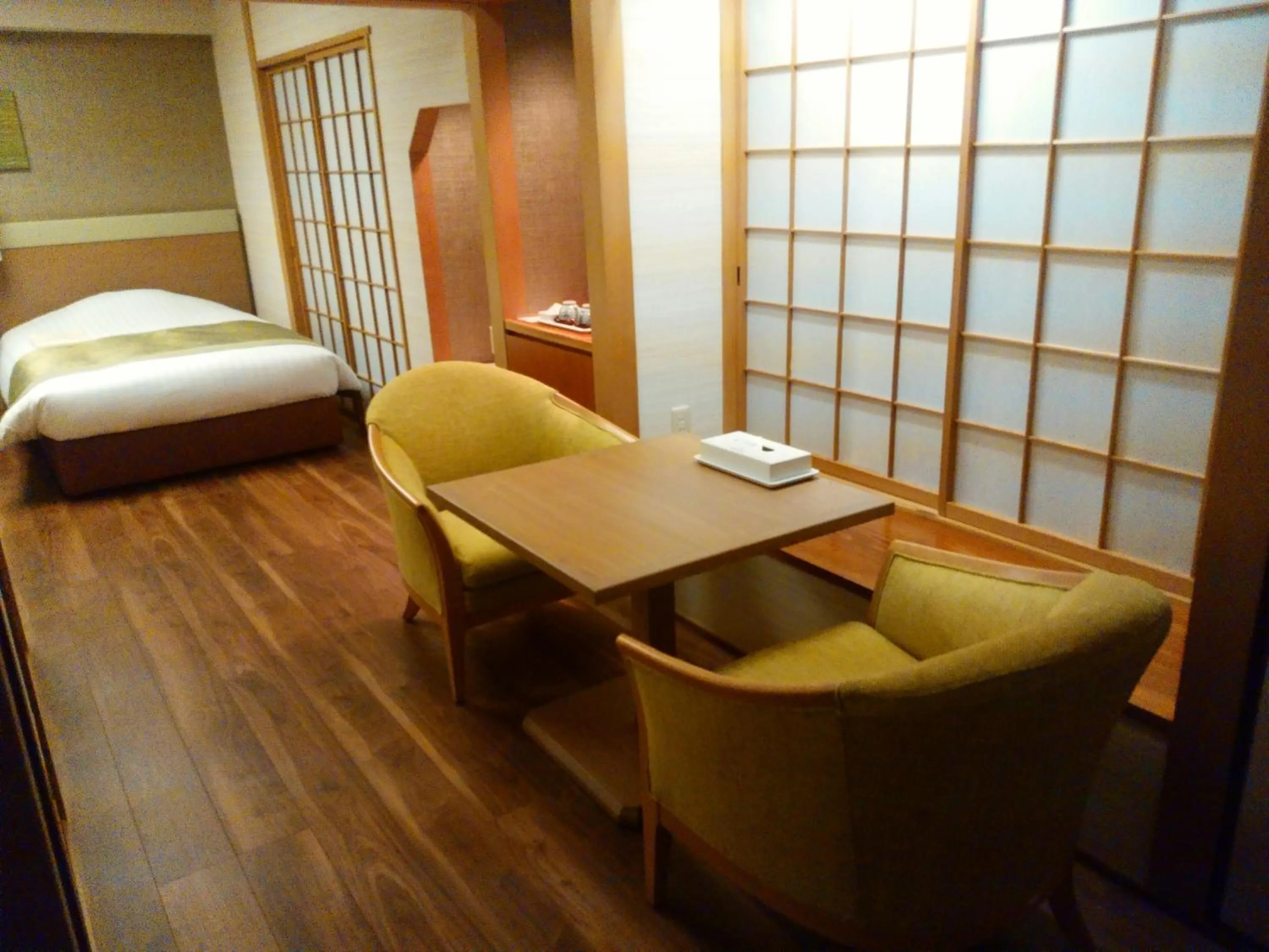 Seating area, Bed in JR Hotel Clement Tokushima