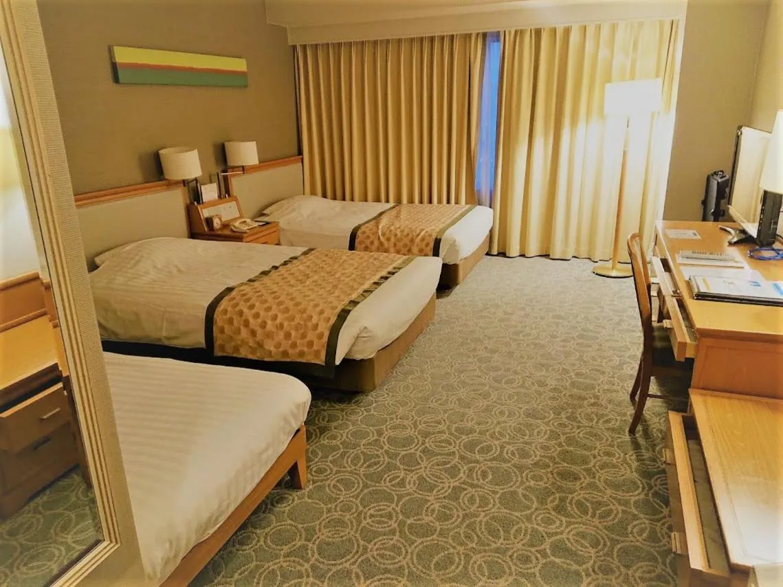 Bed in JR Hotel Clement Tokushima