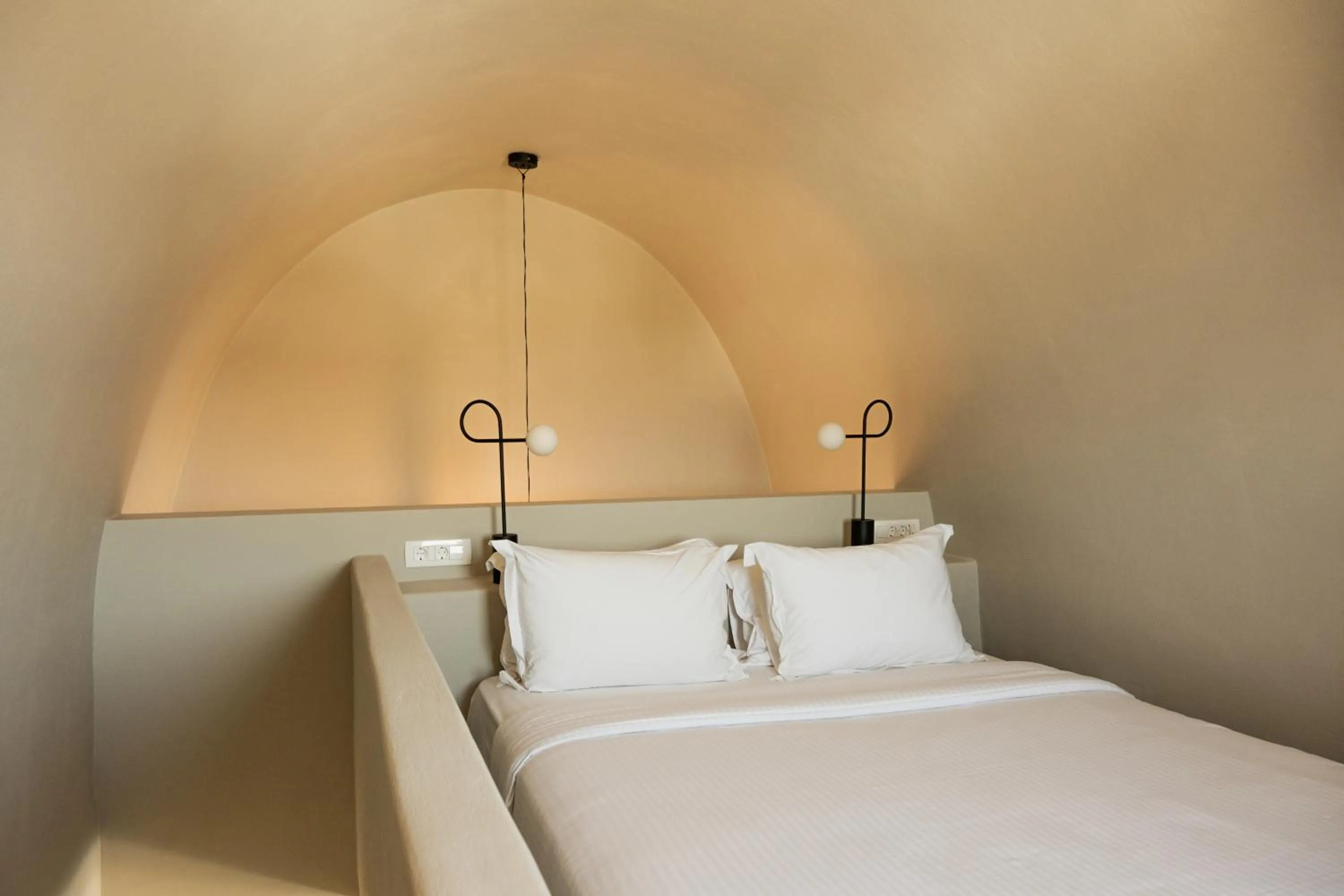 Bed in Black Diamond Suites