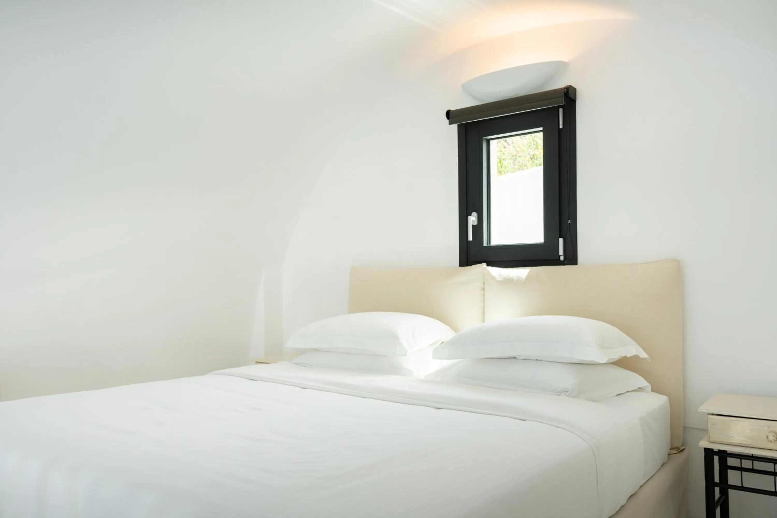 Bed in Black Diamond Suites