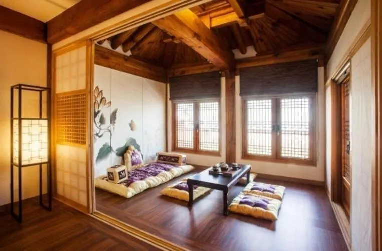 Seating area, Bed in Gyeongwonjae By Walkerhill