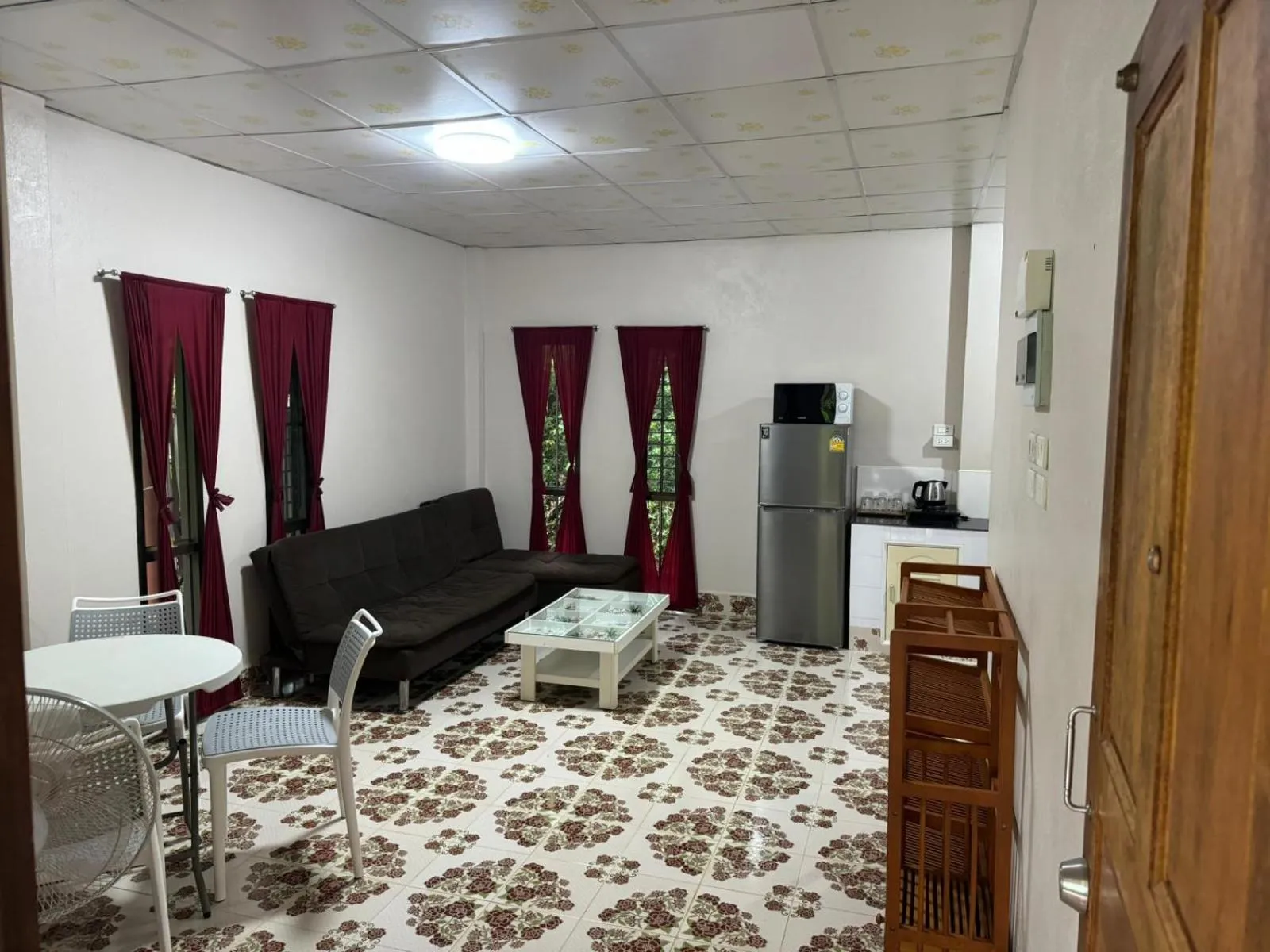 Seating area, Bed in Fine Times Resort