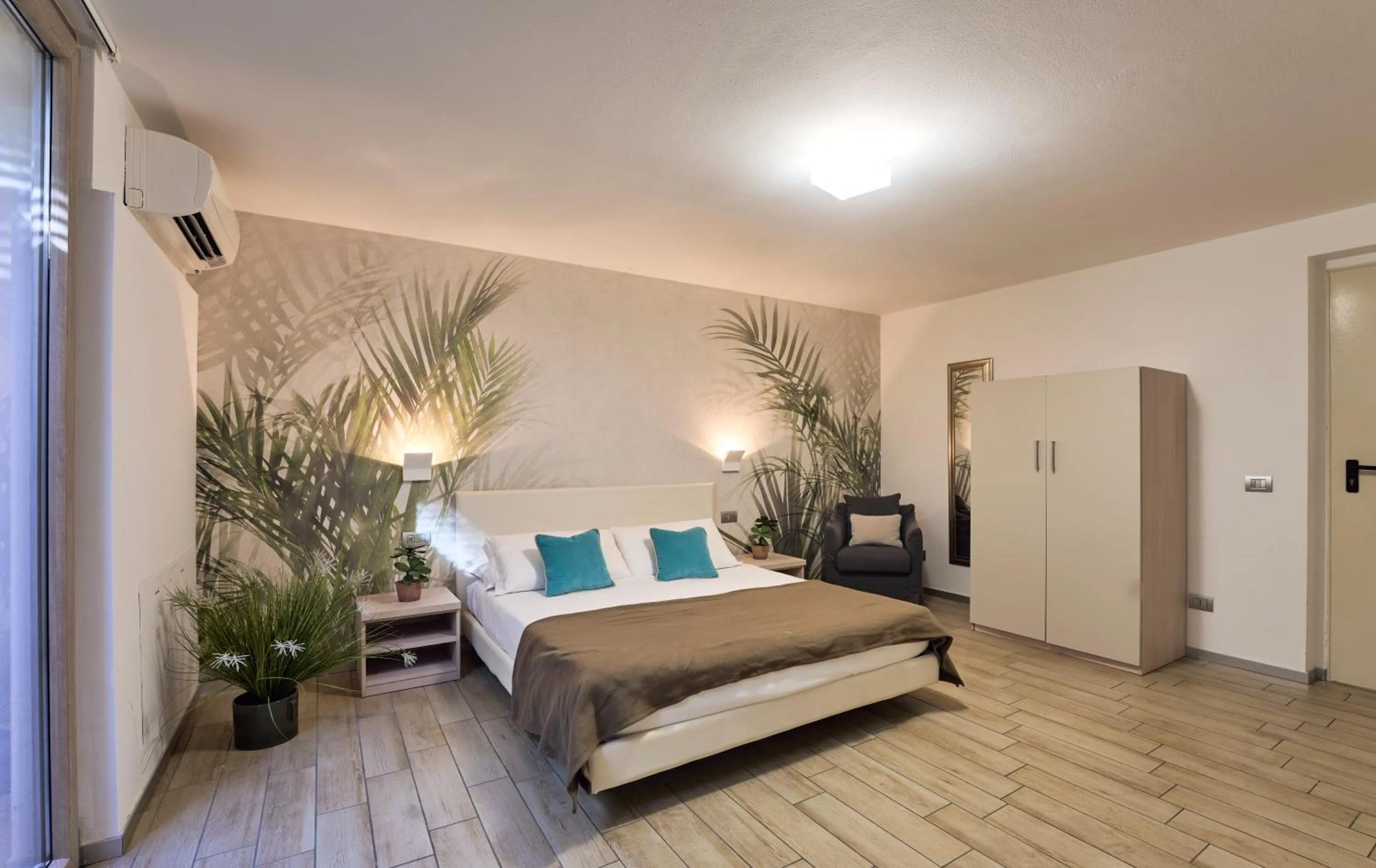 Bedroom, Bed in Bellagio Village - Holiday Apartments by the Lake - Seasonal Warm Pool and Sauna