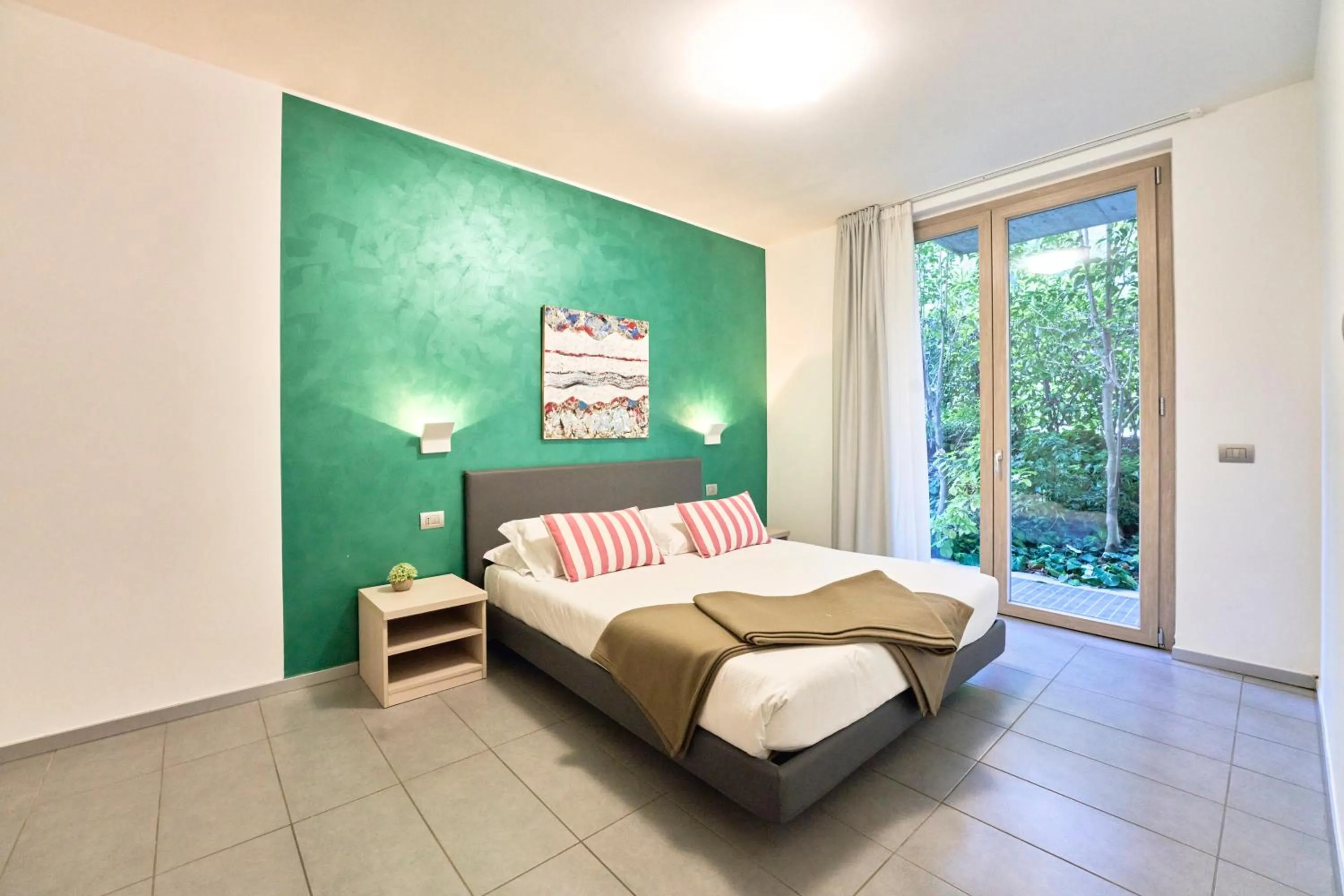 Bedroom, Bed in Bellagio Village - Holiday Apartments by the Lake - Seasonal Warm Pool and Sauna