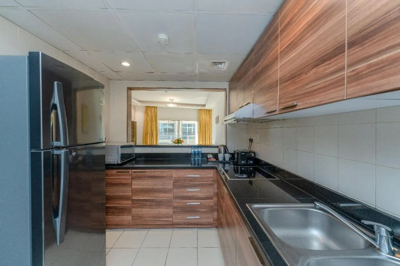 Kitchen or kitchenette in City Stay Prime Hotel Apartments - Al Barsha