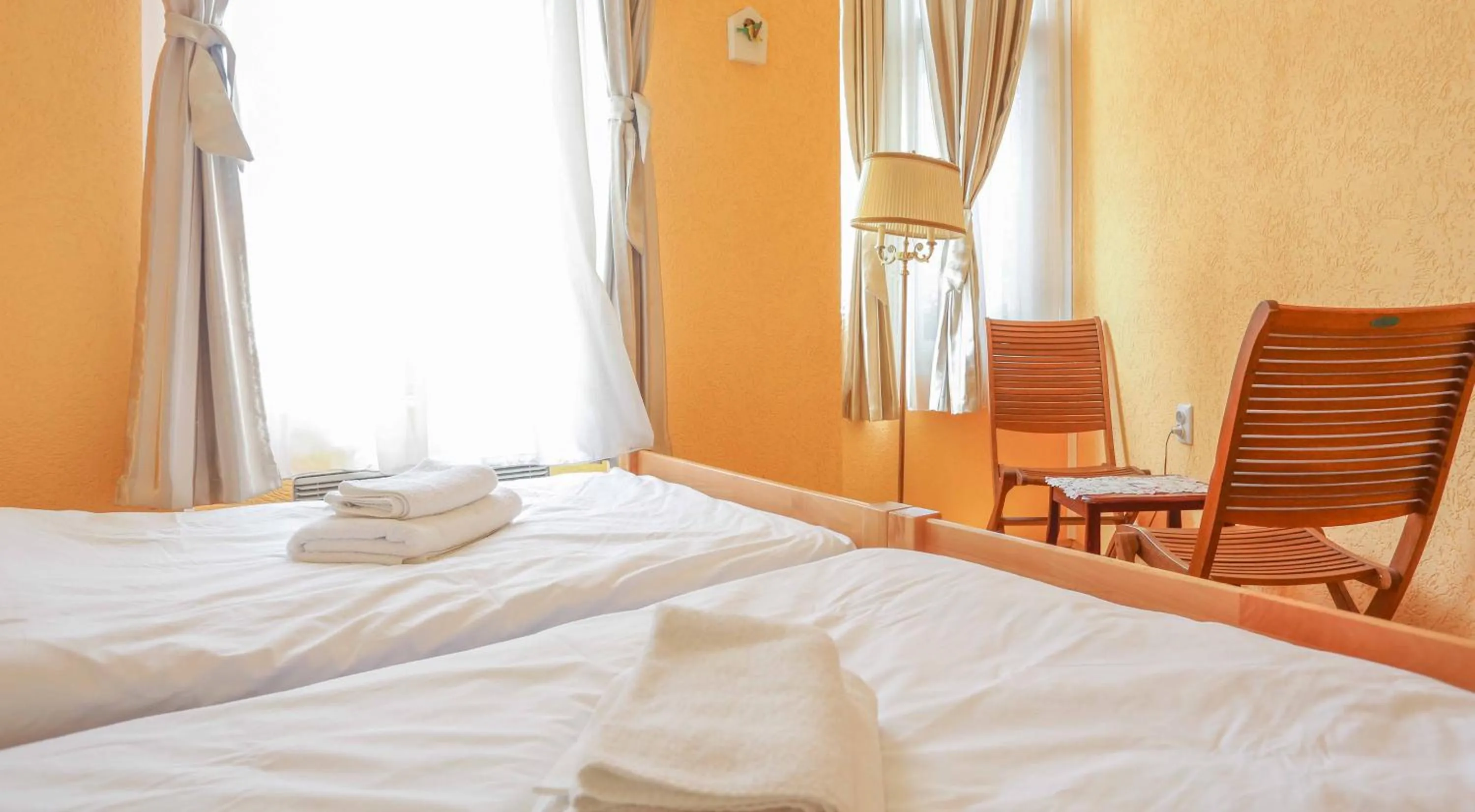 Bed in Pigeon Square Rooms