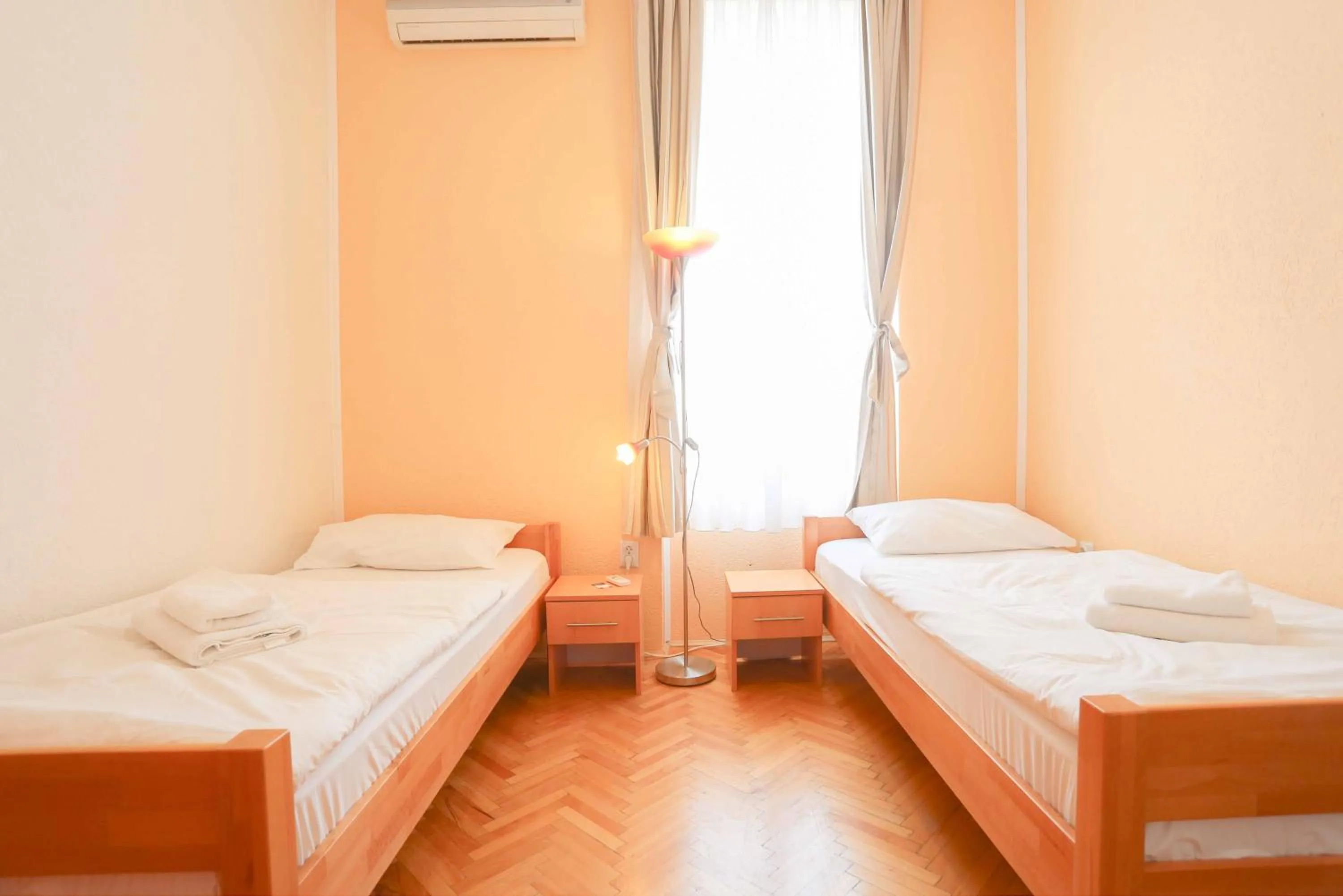 Bed in Pigeon Square Rooms