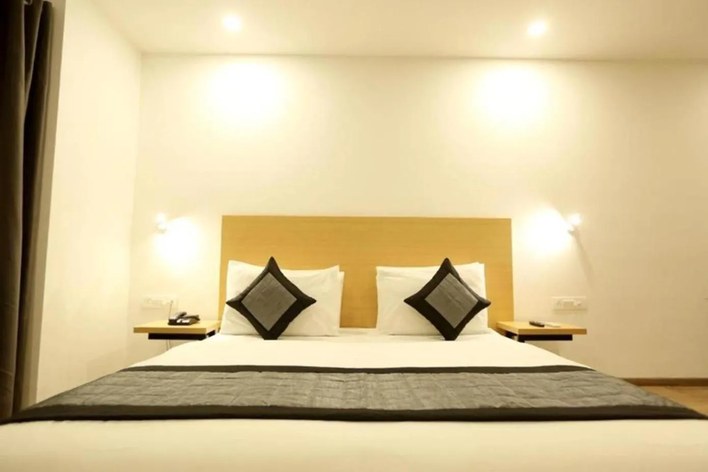 Bed in The Roseman Hotel & Suites