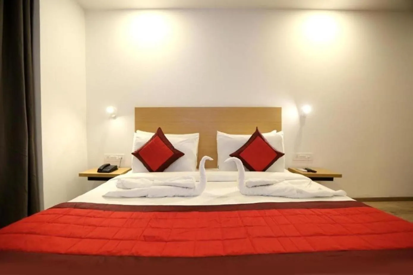 Bed in The Roseman Hotel & Suites