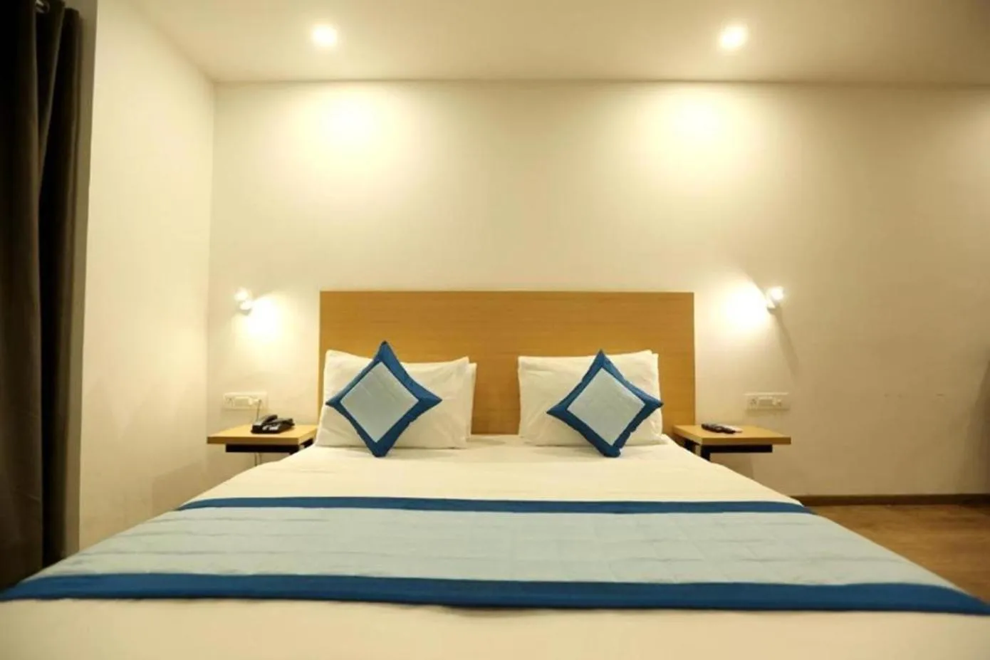 Bed in The Roseman Hotel & Suites