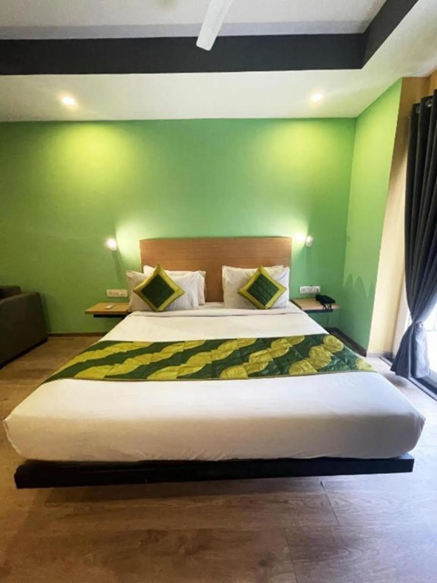 Bed in The Roseman Hotel & Suites