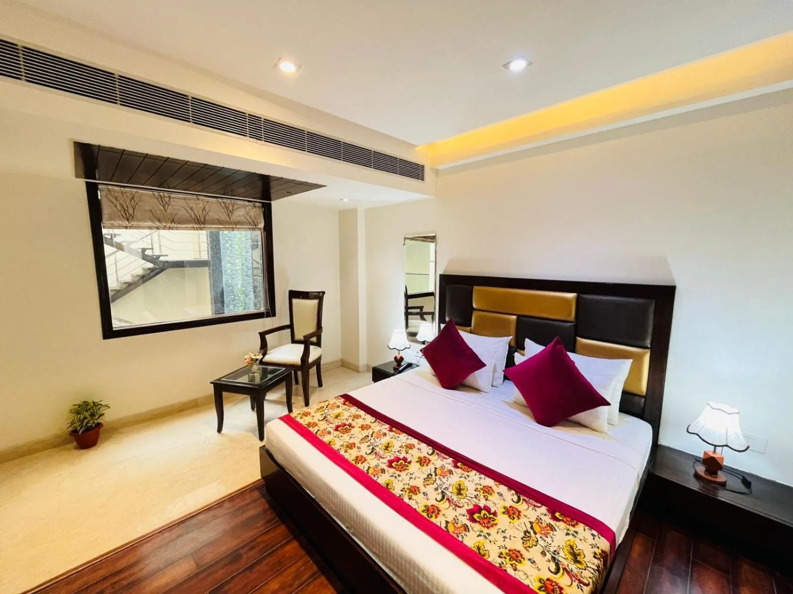 Bed in Hotel Grand Stay